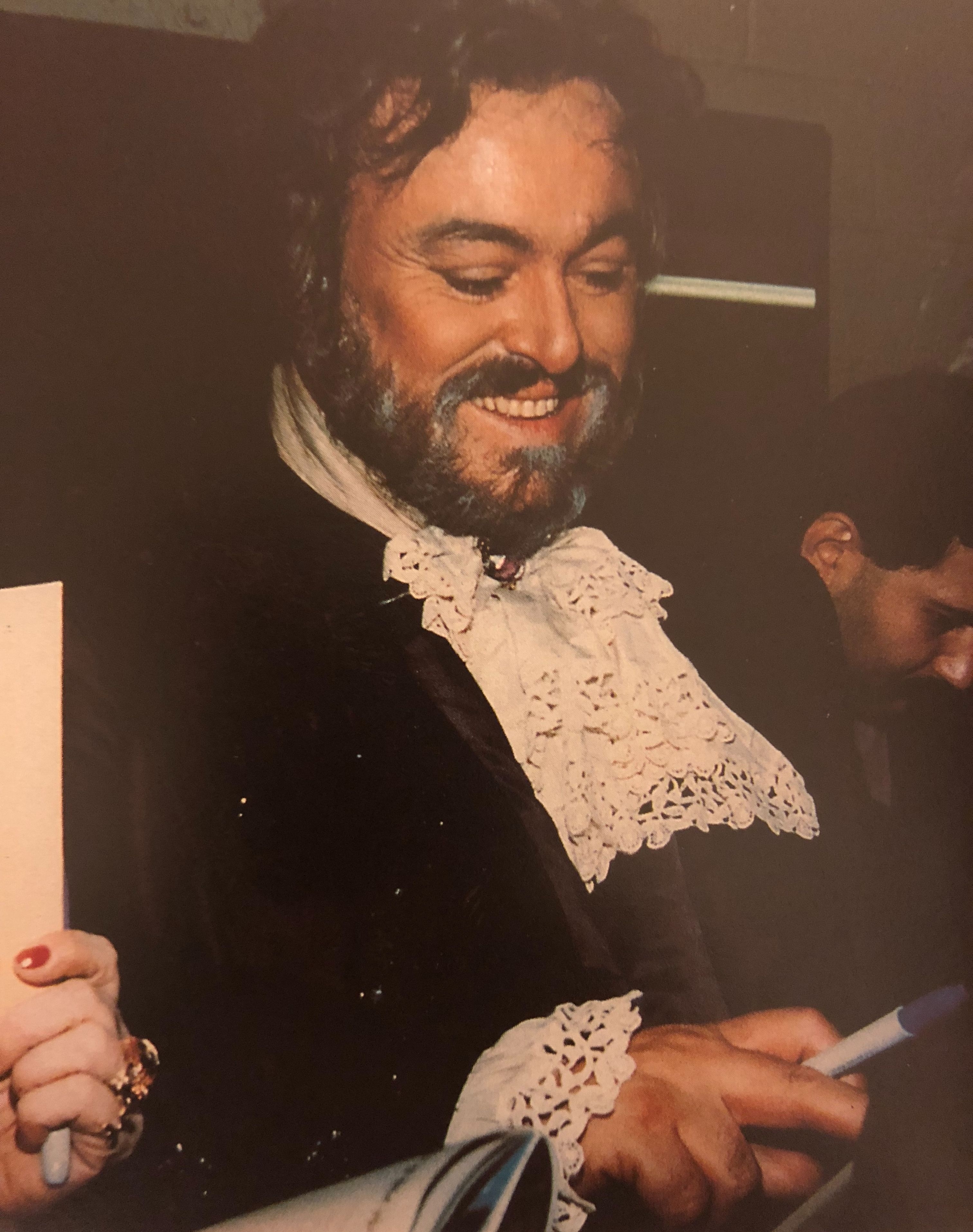 3030x3830 Luciano Pavarotti signs autographs backstage after a performance, Phone