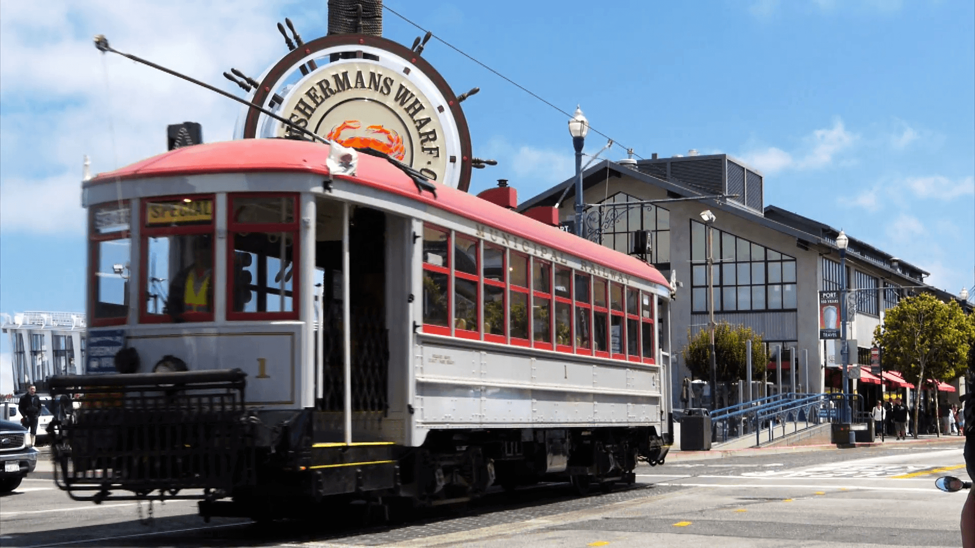 1920x1080 a cable car travels past the famous fisherman's wharf district, Desktop