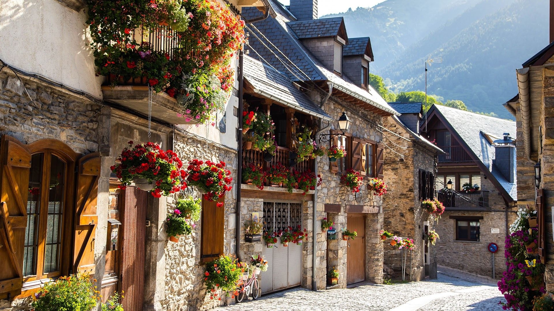 1920x1080 Wallpaper, red flowers, window, door, house, town, mountains, street, summer, Catalonia, Spain, Desktop