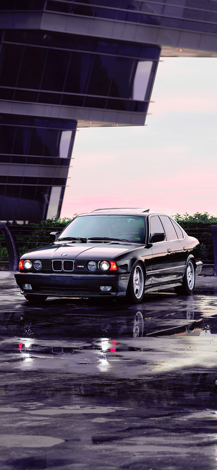 720x1560 Aesthetic Bmw Parked On Wet Asphalt 4K Phone Wallpaper, Phone