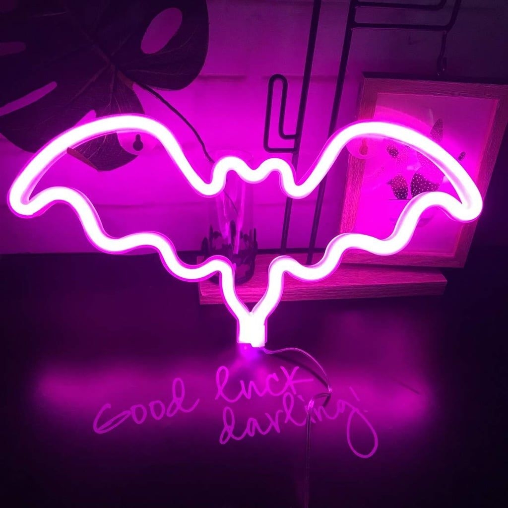 1030x1030 Fiee Pink Bat Shaped Neon Sign Pink Halloween Decorations That Are So Fetch. POPSUGAR Home Photo 4, Phone