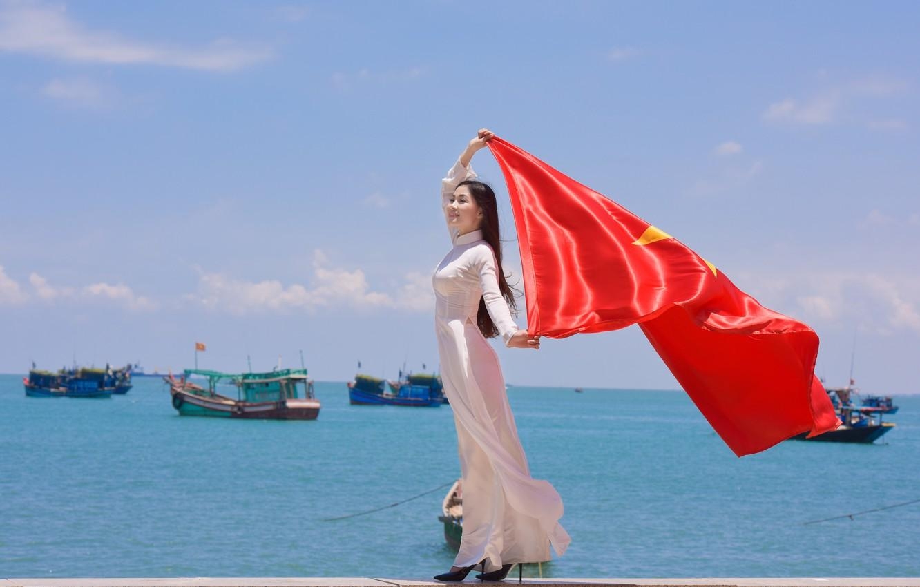 1340x850 Wallpaper girl, face, the wind, star, dress, flag, Vietnam image, Desktop