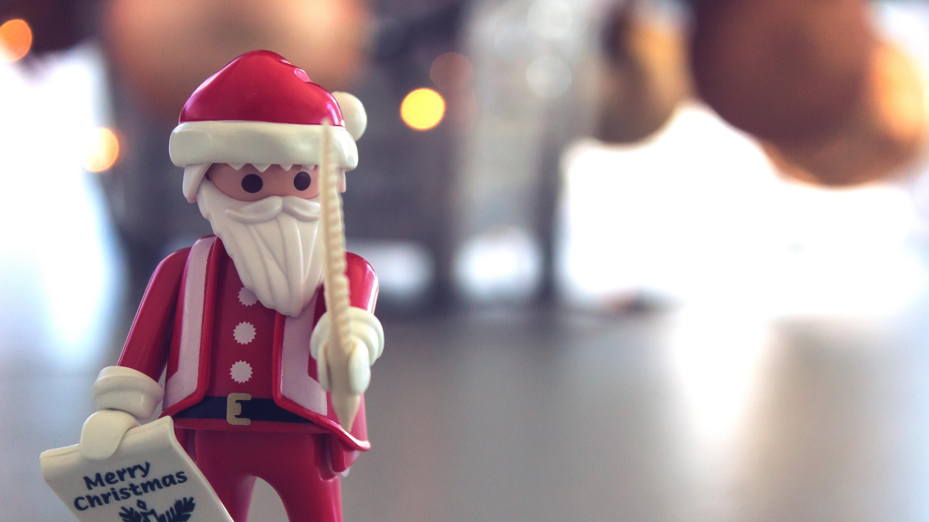 3840x2160 Wallpaper 4k santa claus, christmas, toy, blur, glare 4k, Desktop