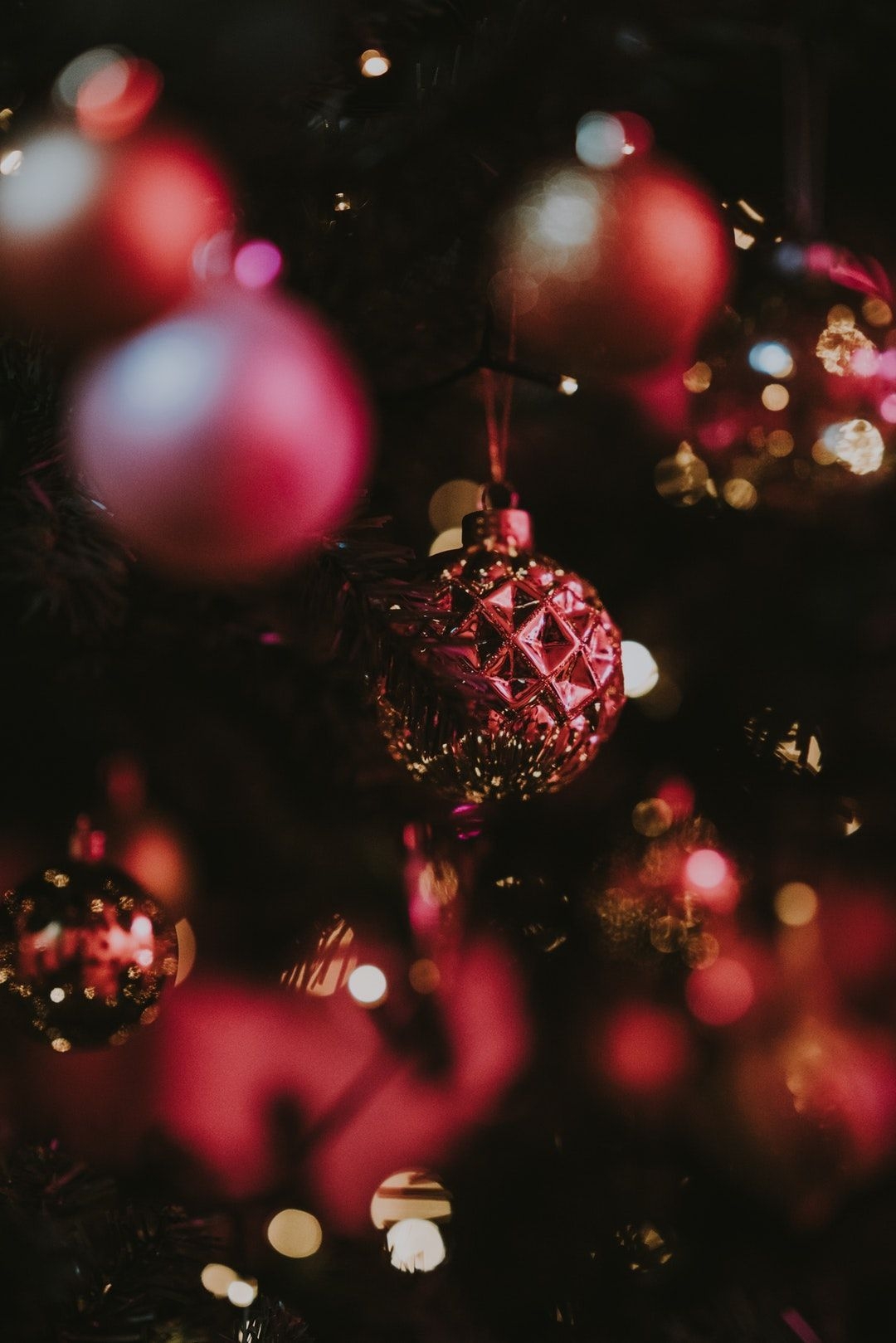 1080x1620 Red / pink baubles hanging on a Christmas tree photo by Annie Spratt on. Wallpaper iphone christmas, Merry christmas wallpaper, Christmas wallpaper, Phone