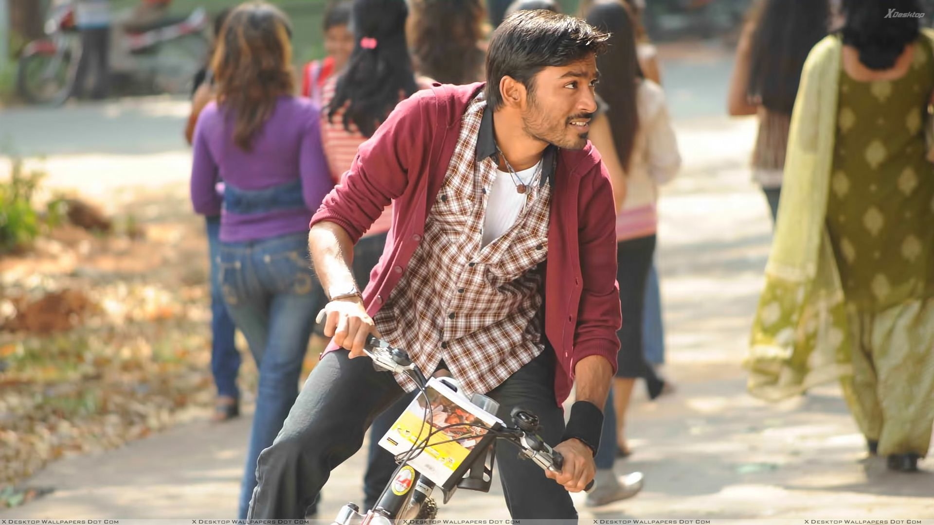 1920x1080 Dhanush Looking Side On Bycycle Outside The College In Kutty Movie, Desktop