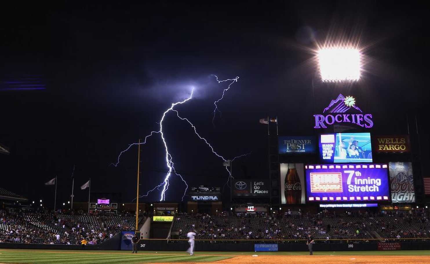 1490x920 Stormy skies fill big baseball venues: Rockies, Reds, and Red Sox, Desktop