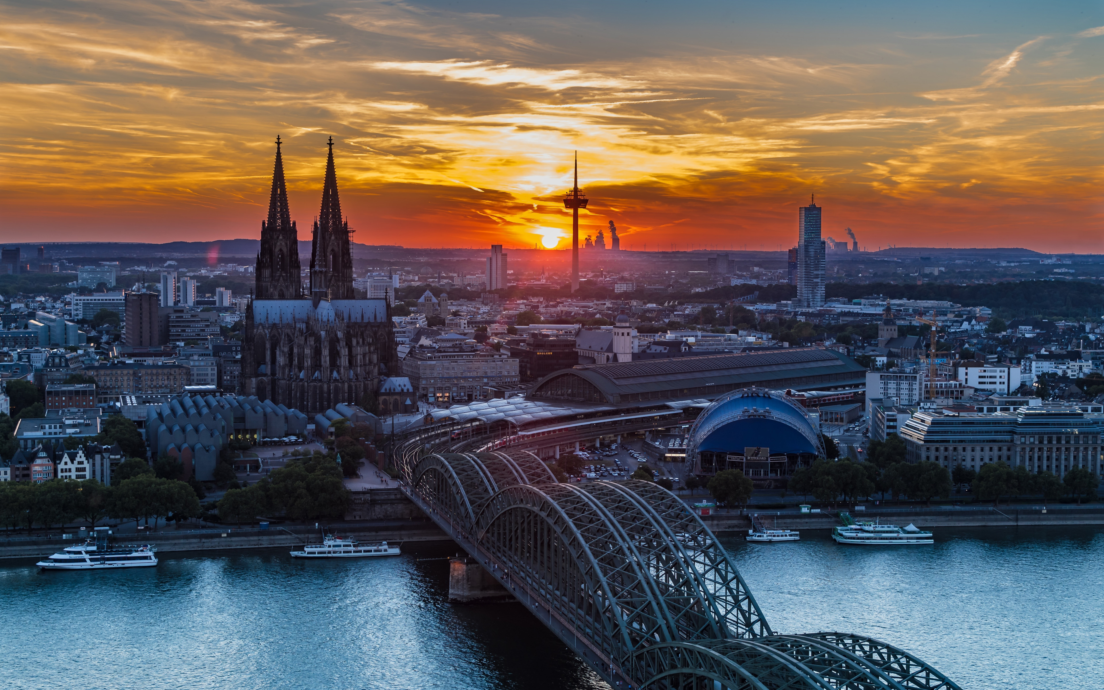 3840x2400 Download wallpaper Hohenzollern Bridge, 4k, Cologne Cathedral, Germany, sunset, Europe, Cologne at evening, german cities, Cologne for desktop with resolution. High Quality HD picture wallpaper, Desktop