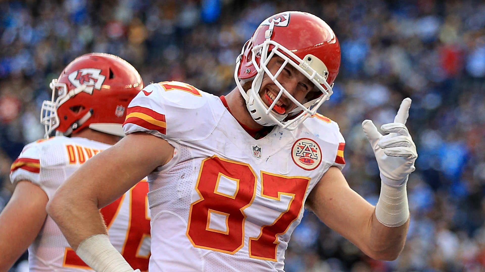 1920x1080 Chiefs' Travis Kelce arrives for playoff game using shoe as phone, Desktop