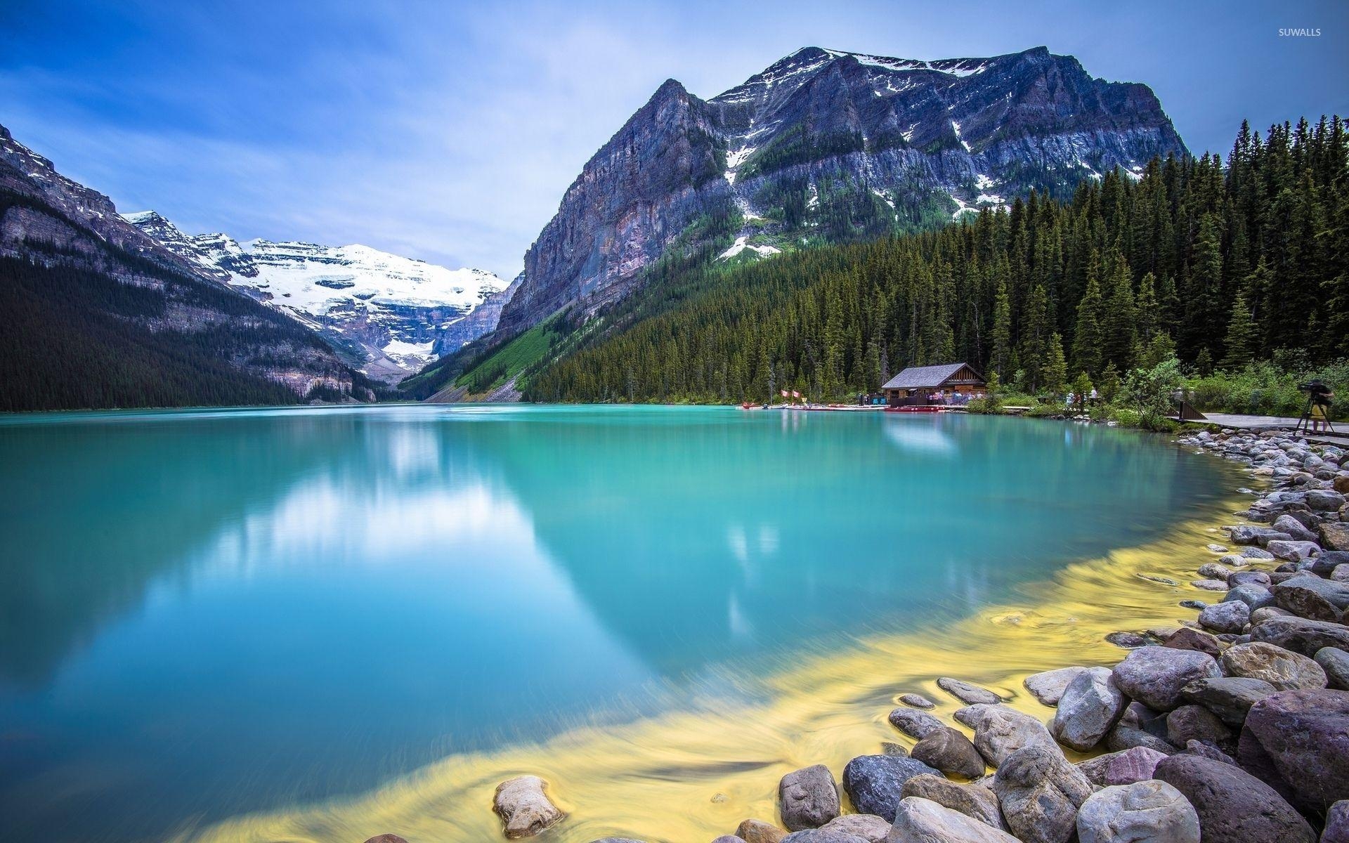 1920x1200 Amazing turquoise water lake guarded by rocky mountains wallpaper, Desktop