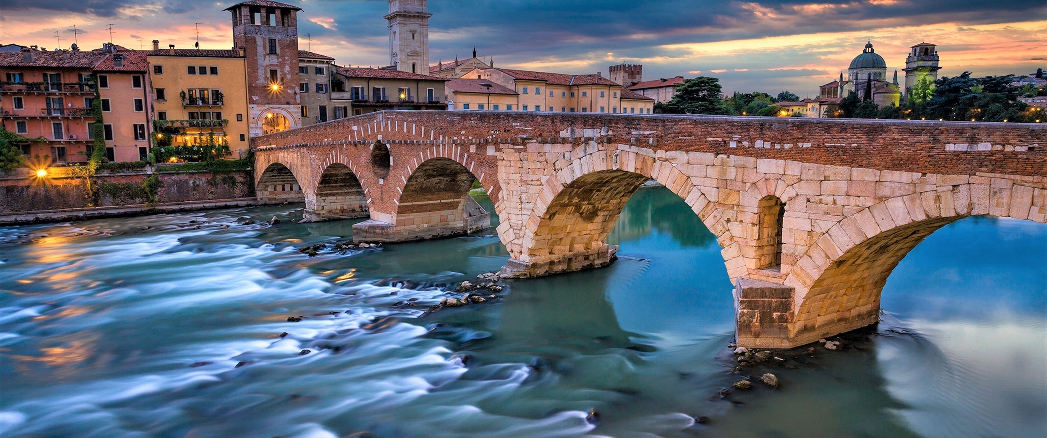 3440x1440 Download  Italy, Verona, Bridge, Dark Clouds, Buildings, Dual Screen