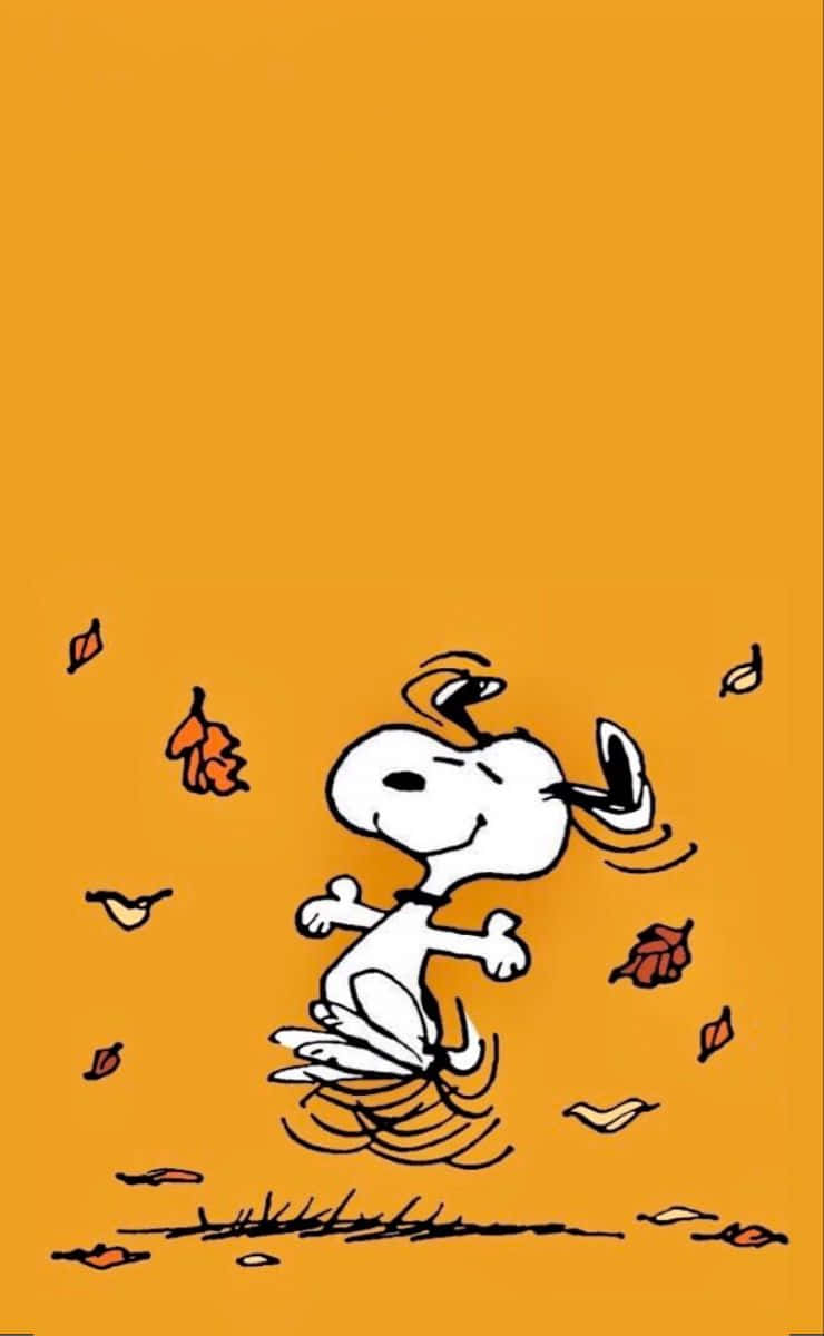 740x1200 Download Snoopy celebrates autumn in all its glory Wallpaper, Phone