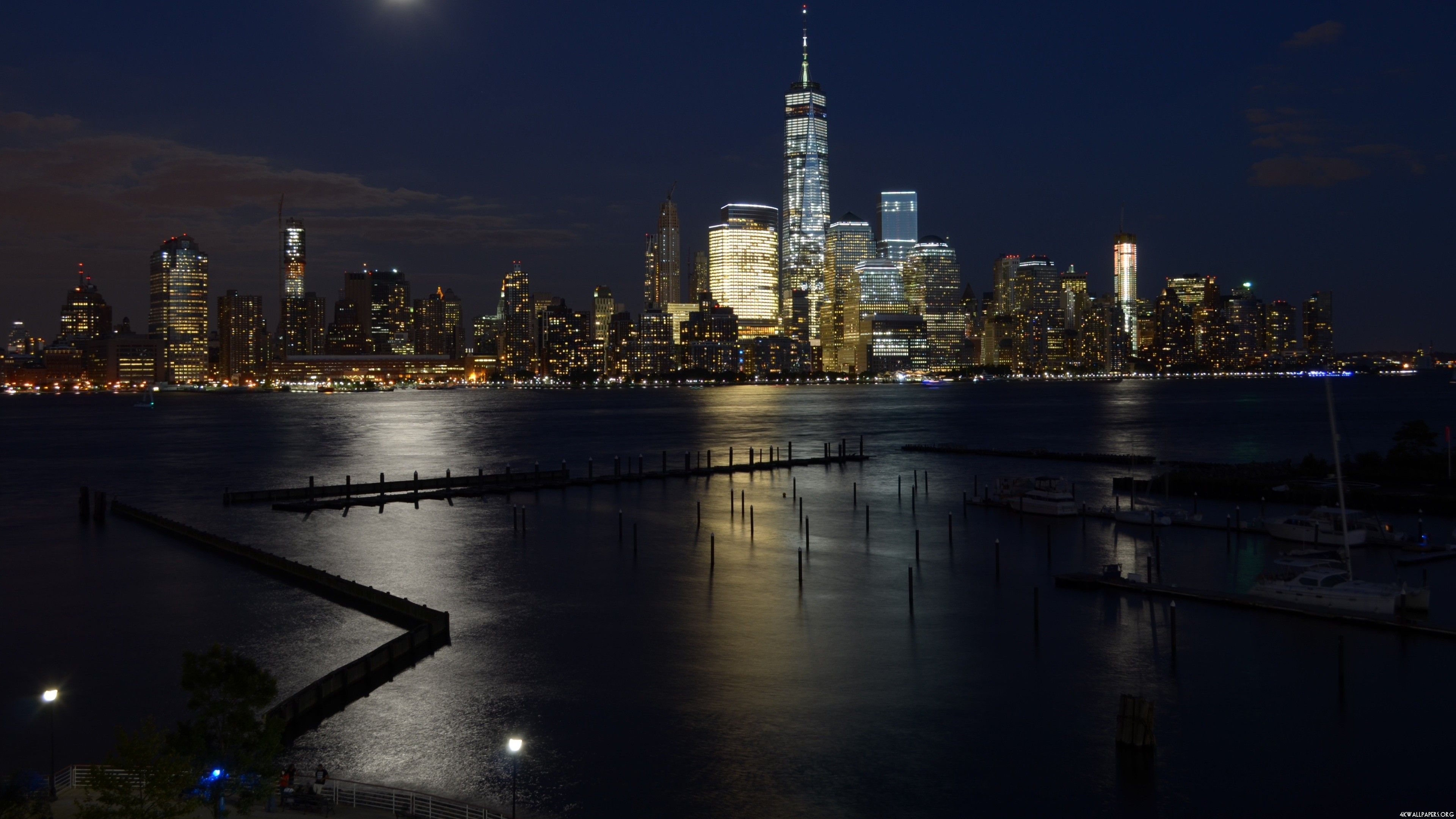 3840x2160 Wallpaper, lights, city, cityscape, night, water, building, reflection, clouds, skyline, skyscraper, evening, New York City, horizon, yachts, USA, dusk, Manhattan, One World Trade Center, metropolis, downtown, darkness, landmark, urban area, atmosphere, Desktop