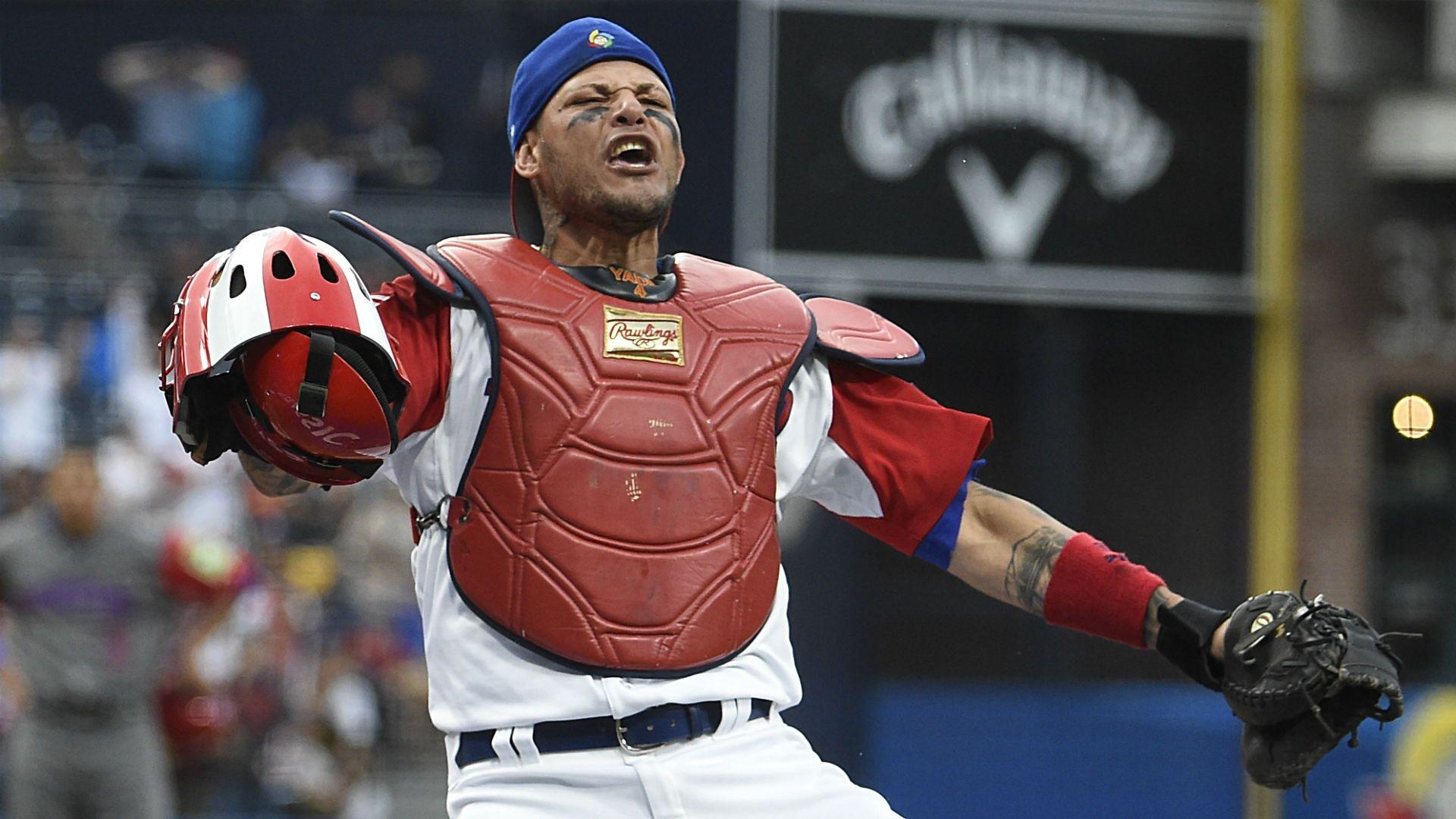 1920x1080 The internet wants to know how a ball got stuck to Yadier Molina's, Desktop
