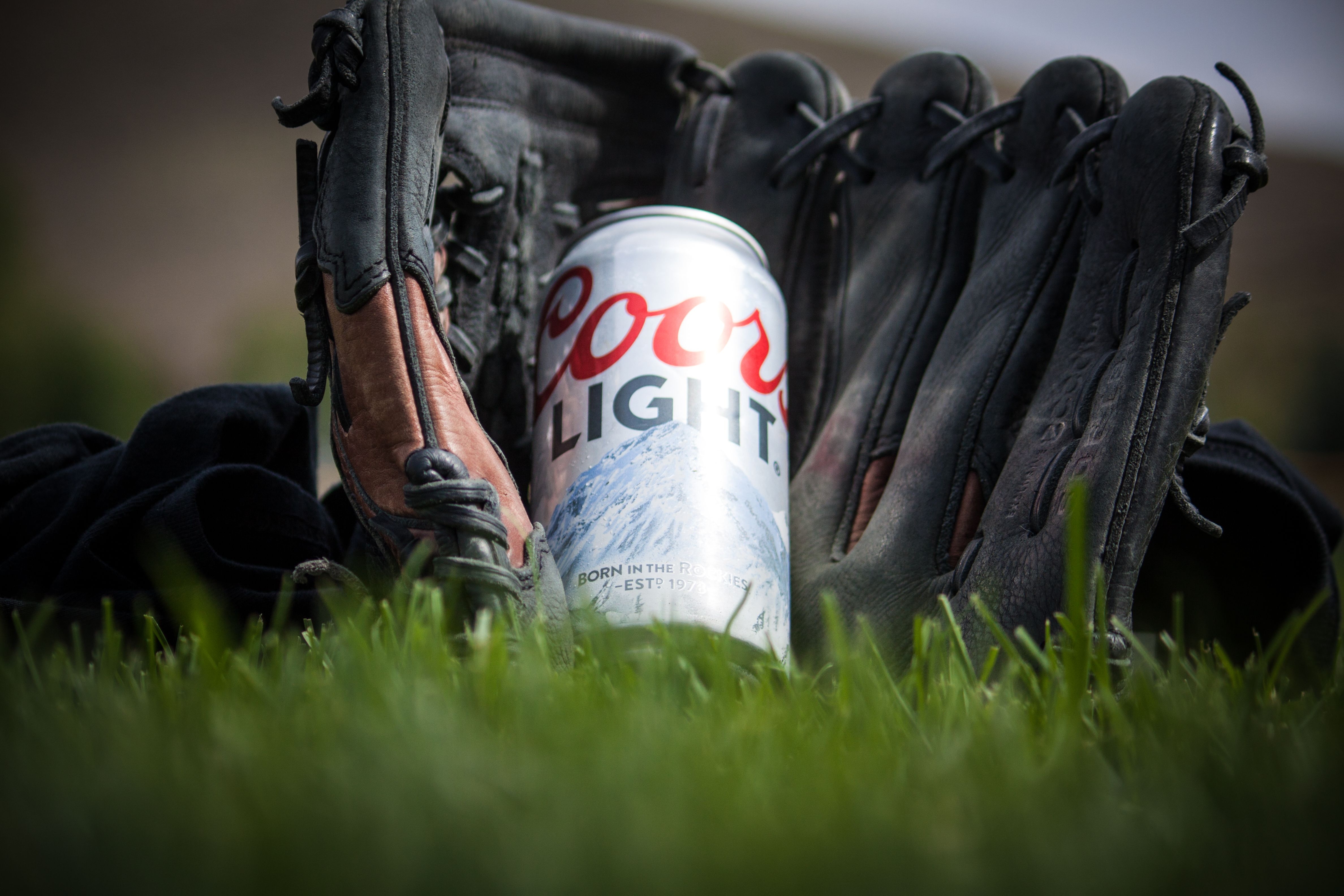 4760x3170 Close Up Photography of Coors Light Beer Near Black Baseball Mitts · Free, Desktop