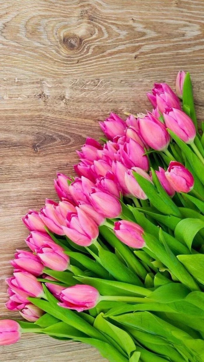 700x1250 Pink Tulips Wooden Background Phone Wallpaper Happy Spring Image. Flower Background Iphone, Summer Wallpaper Phone, Spring Wallpaper, Phone