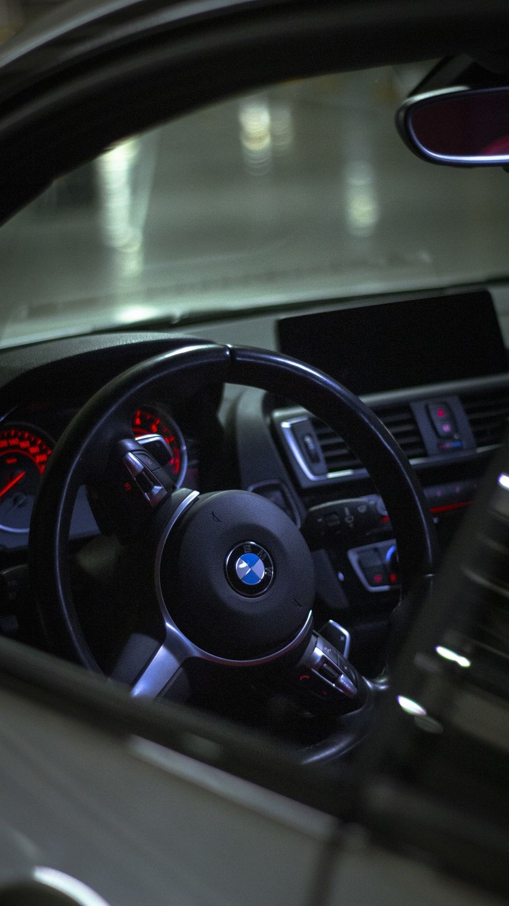 1000x1780 black bmw car steering wheel photo, Phone