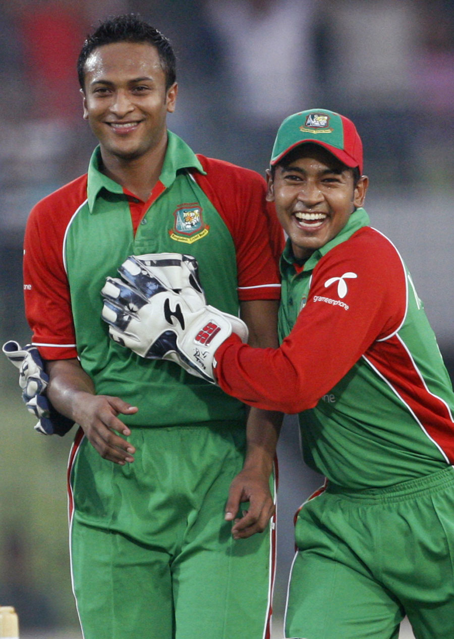 900x1270 Shakib Al Hasan and Mushfiqur Rahim celebrate Andre Russell's dismissal. Photo. Bangladesh v West Indies, Phone