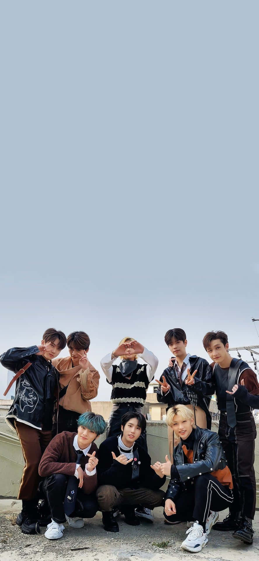 890x1920 Download Members Of South Korean Pop Group Stray Kids Strike A Pose In Tech Inspired Outfits For Their 2020 Promotional Photo Shoot. Wallpaper, Phone