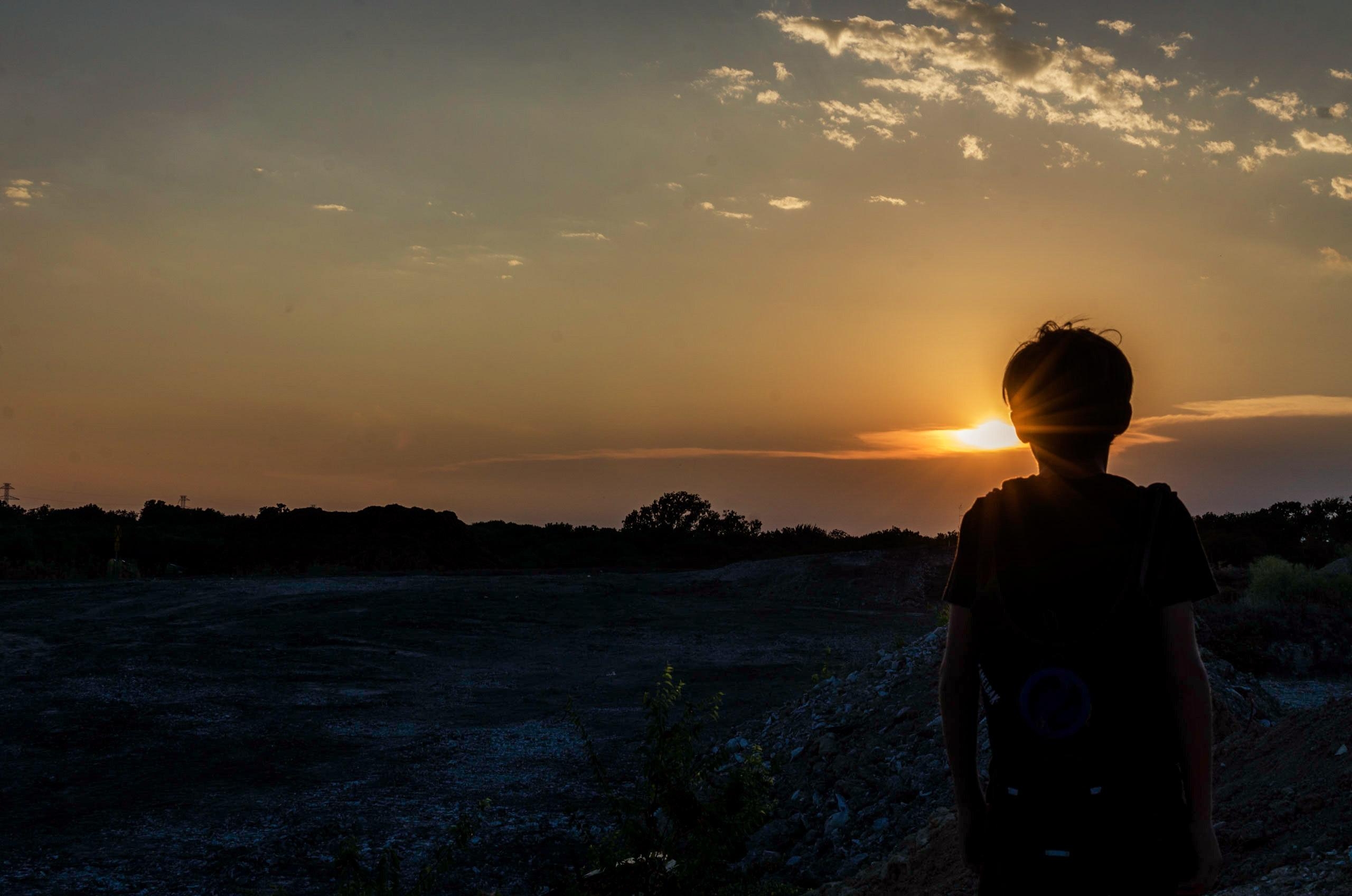 2560x1700 Silhouette of a Boy During Sunset · Free, Desktop