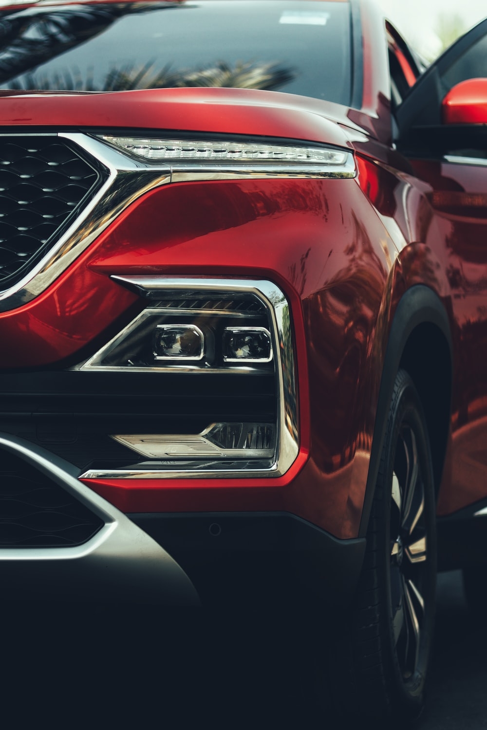 1000x1500 red and silver car in a dark room photo, Phone