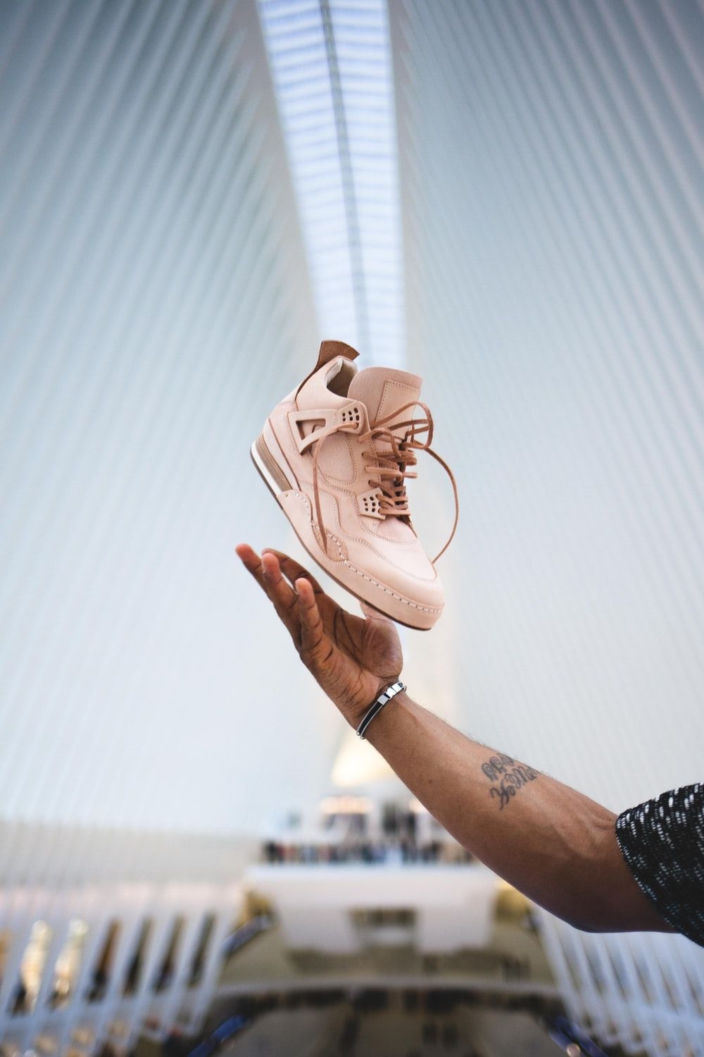 1000x1500 Close Up Photography Of Person Wears Brown And White Nike Air Max Photo, Phone