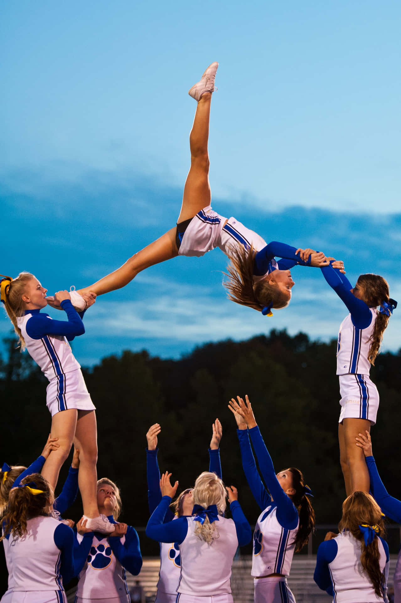 1280x1920 Cheerleaders Performing Stunt Picture, Phone