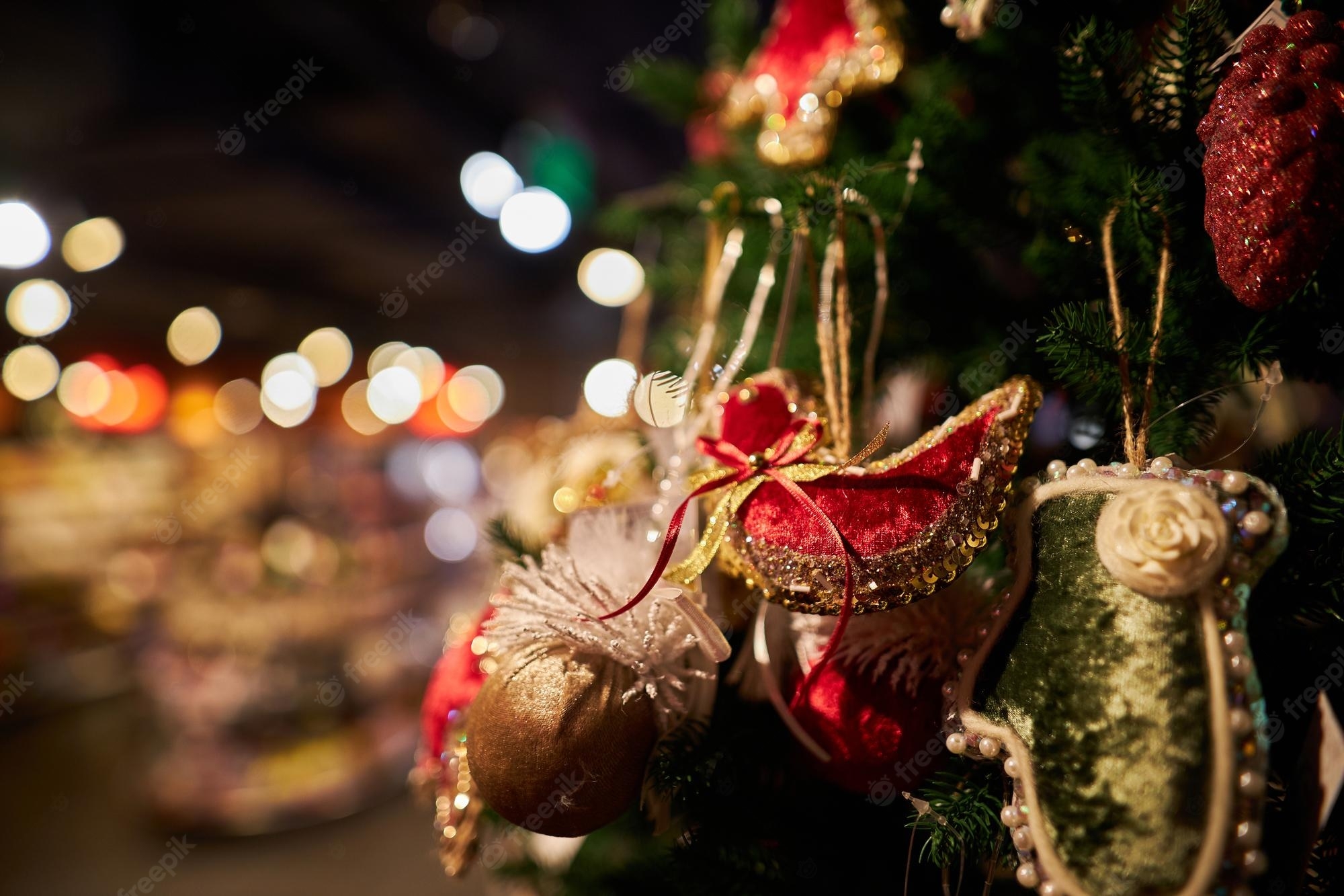 2000x1340 Premium Photo. New year's decorations 2023 new year's decorative decorations on the christmas tree closeup, Desktop