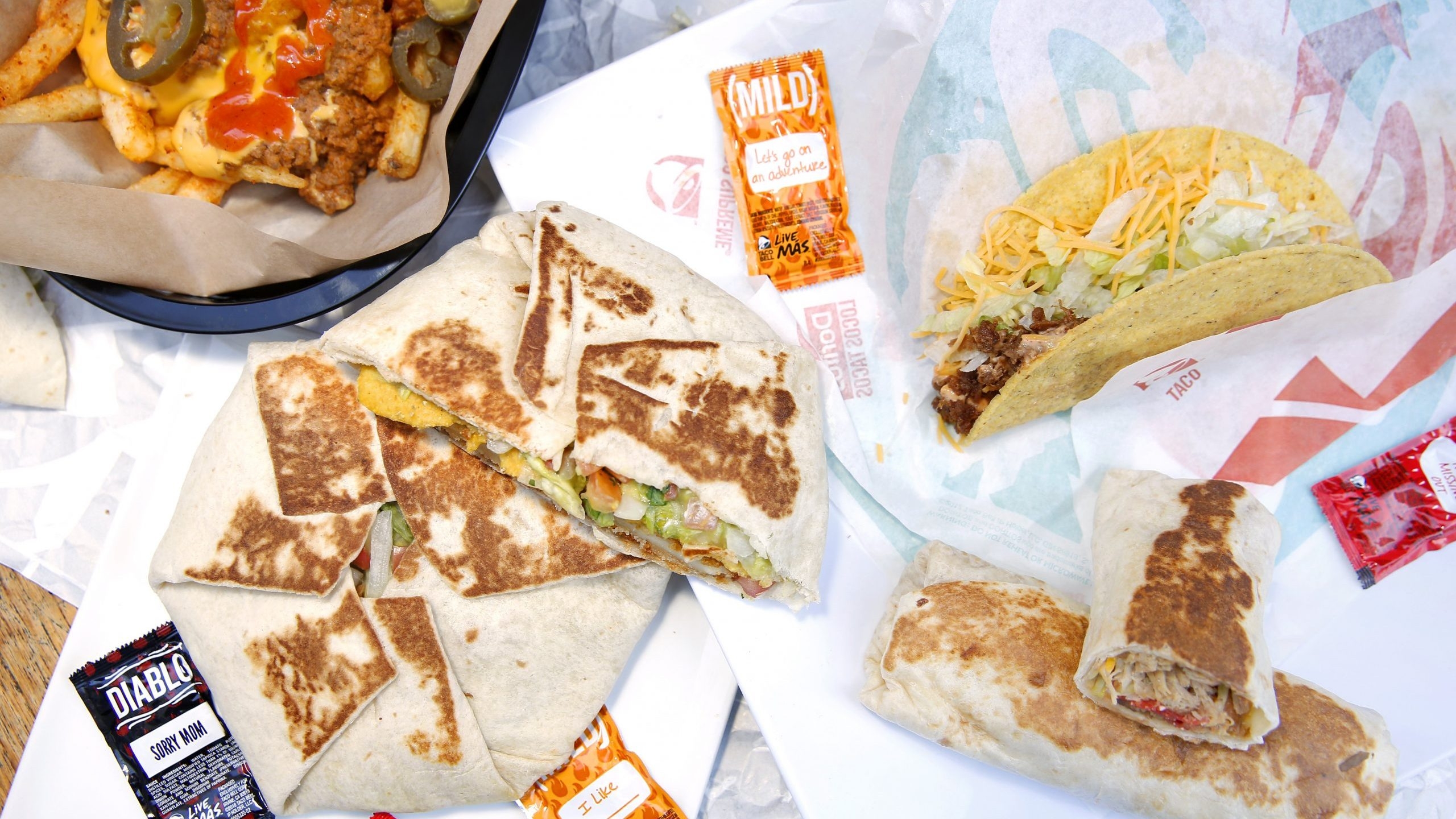 2560x1440 Taco Bell to Start Offering $100K Salary Jobs at Some U.S. Locations, Desktop