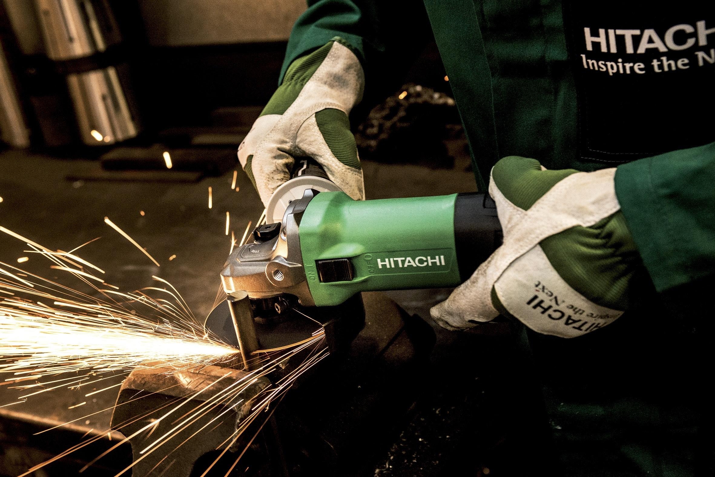 2370x1580 Person Operating Hitachi Angle Grinder · Free, Desktop