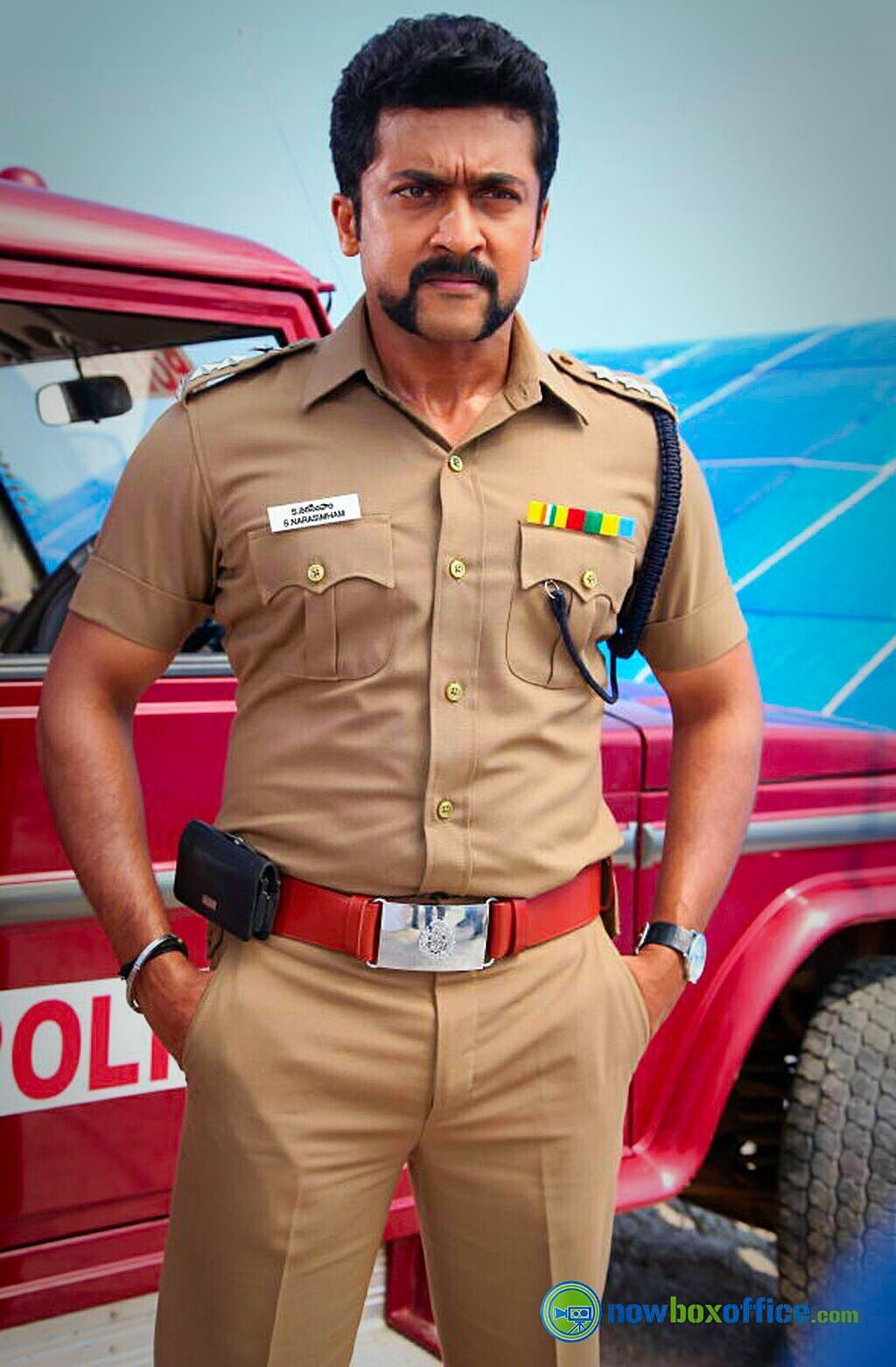 1030x1570 Suriya as a virile police officer with a cosmically awesome moustache in the Bollywood movie Singham. Famous indian actors, Surya actor, Police uniforms, Phone