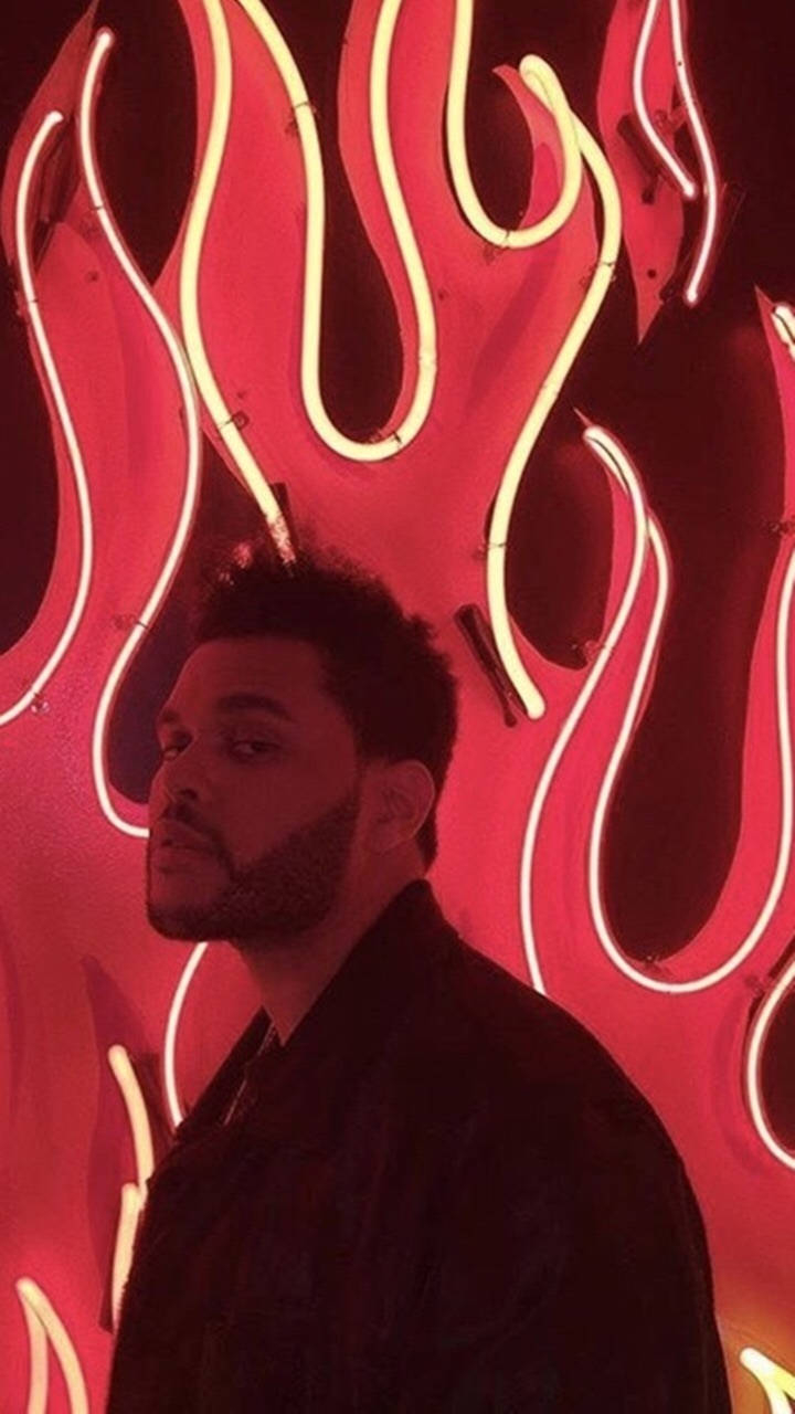 720x1280 Download The Weeknd Posing In Red Flames Wallpaper, Phone