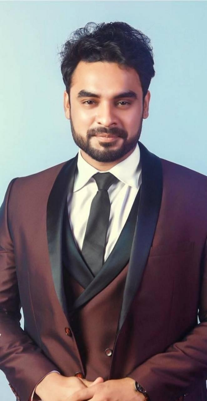 670x1280 Tovino Thomas Wallpaper, Phone