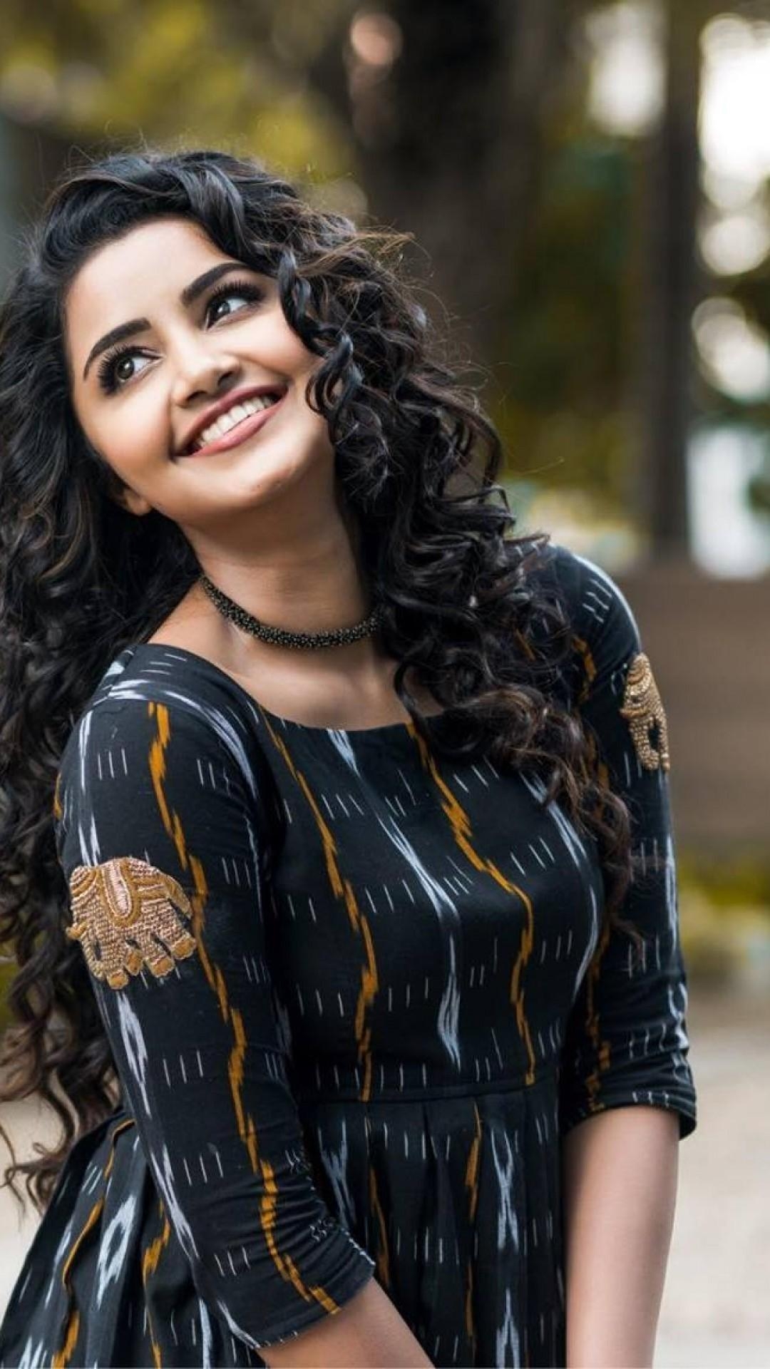 1080x1920 Download  Anupama Parameswaran, Actress, Smiling, Phone