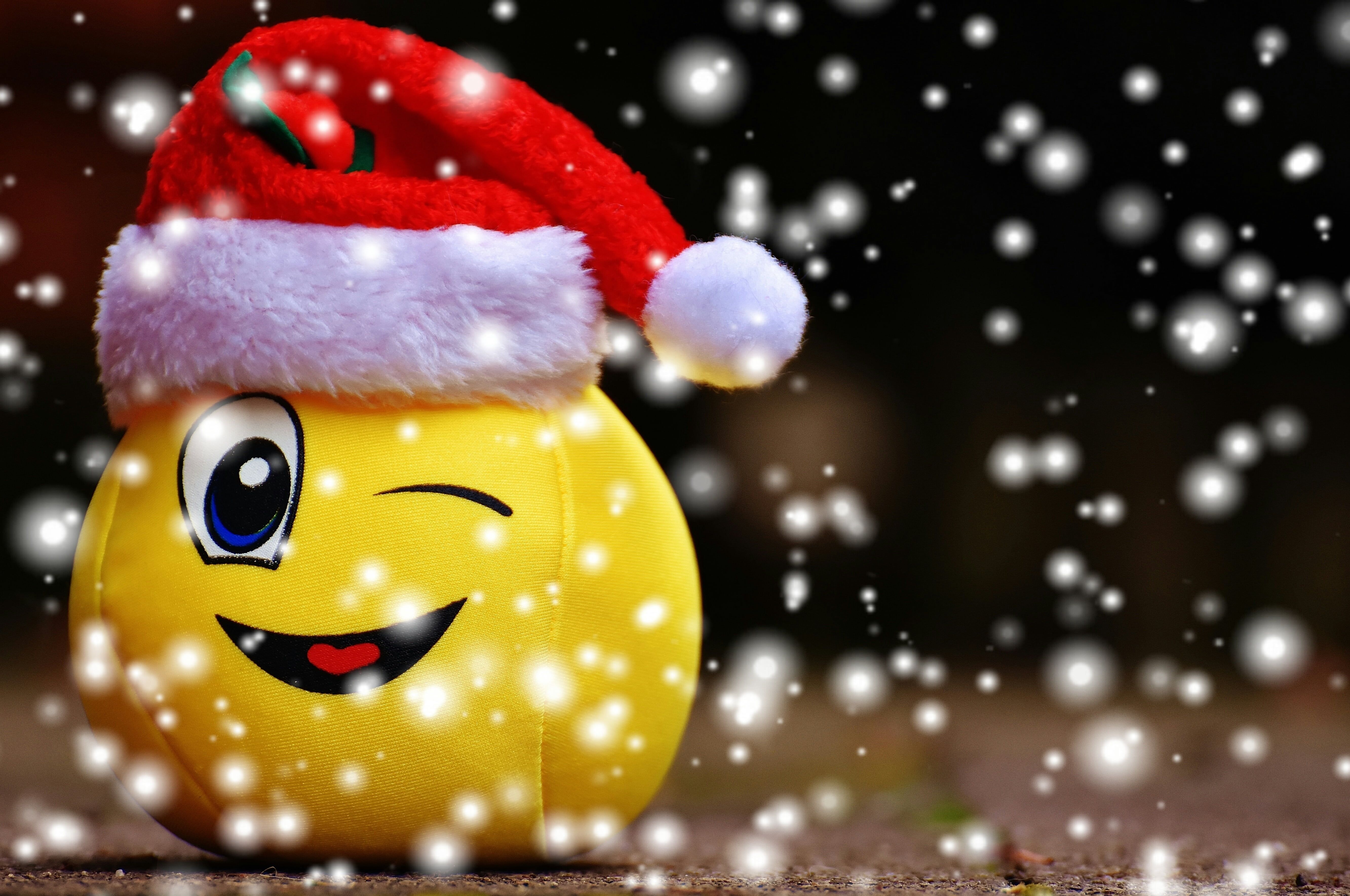 5330x3540 yellow emoji plush toy wearing red Santa Claus hat #christmas #smiley #snow #funny #laugh #wink santa. Santa claus wallpaper, Christmas picture, Santa claus hat, Desktop