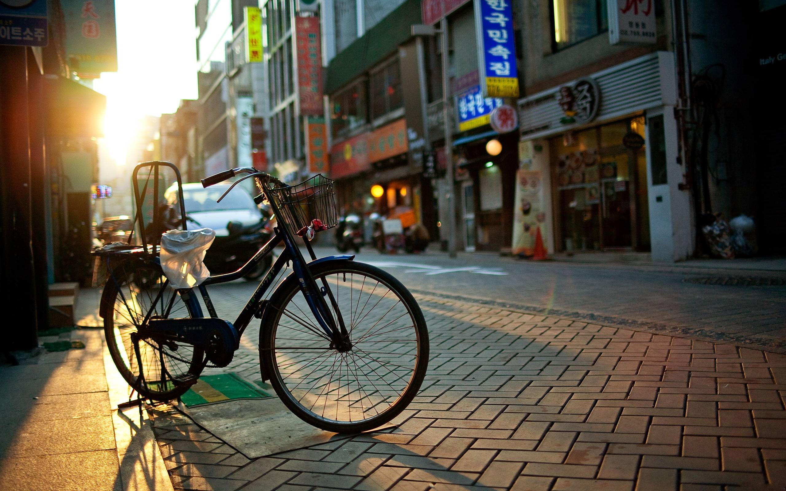 2560x1600 Bicycle parked on the street wallpaper, Desktop