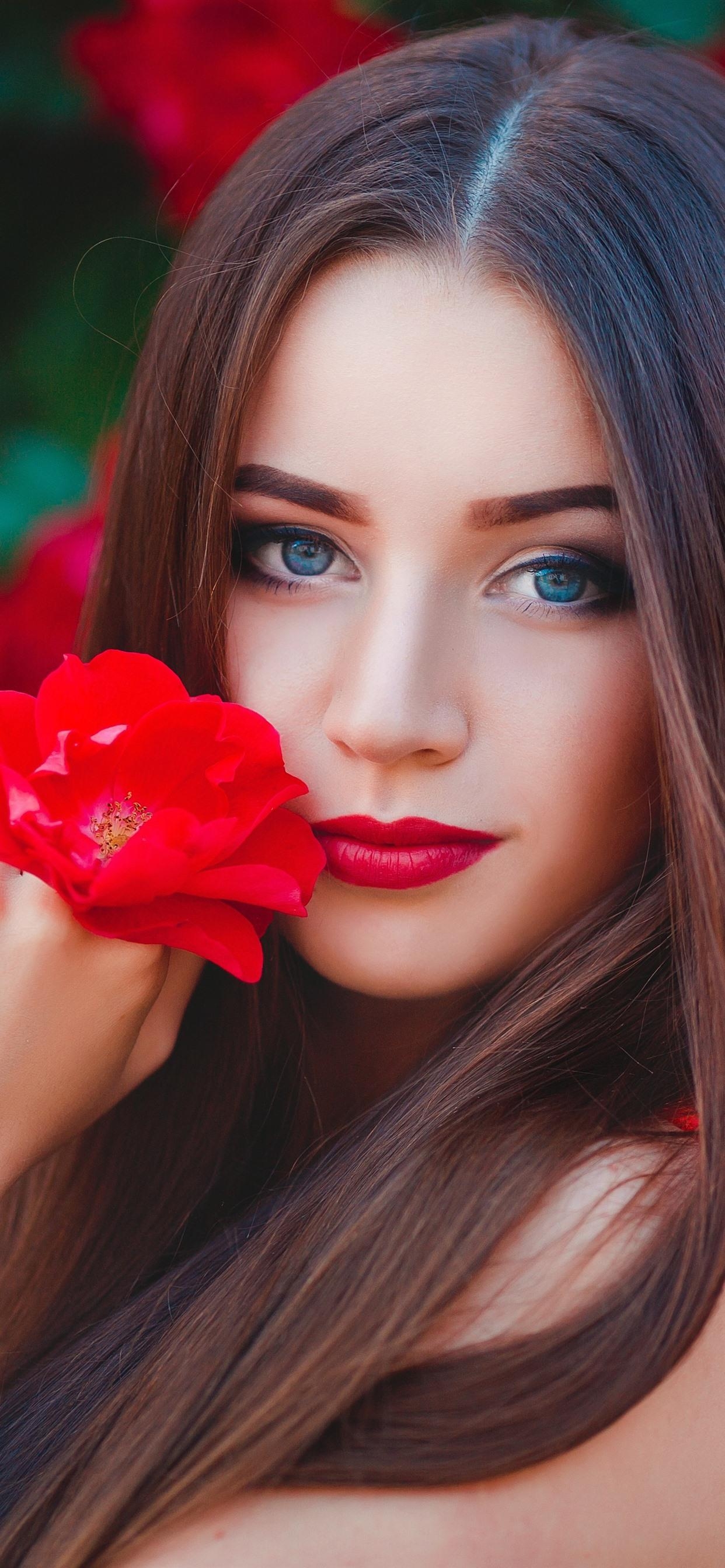 1250x2690 Blue eyes girl, brown hair, red flowers  iPhone XS, Phone