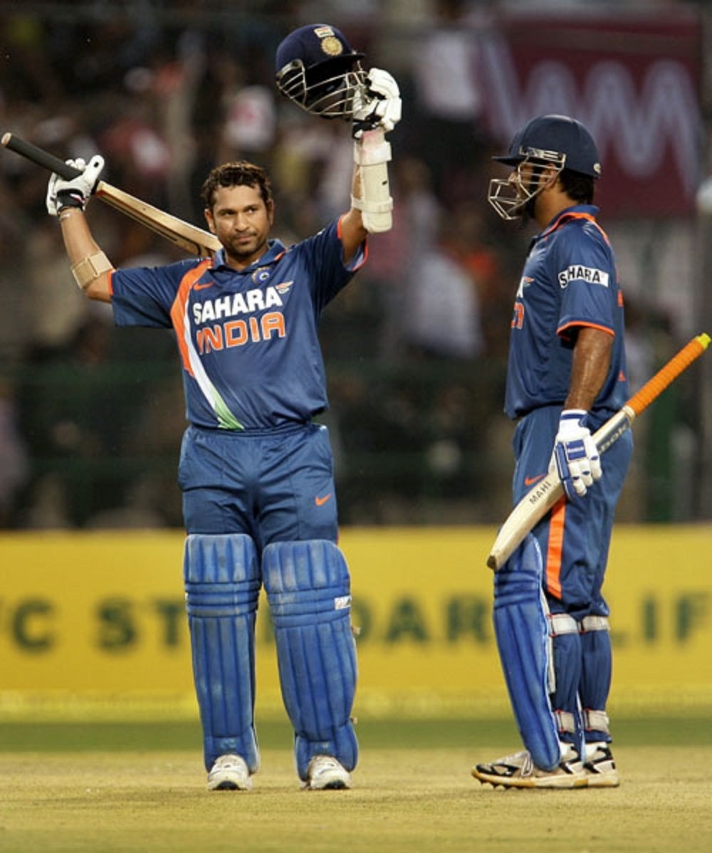 1000x1200 MS Dhoni is happy as Sachin Tendulkar reaches 200, Phone