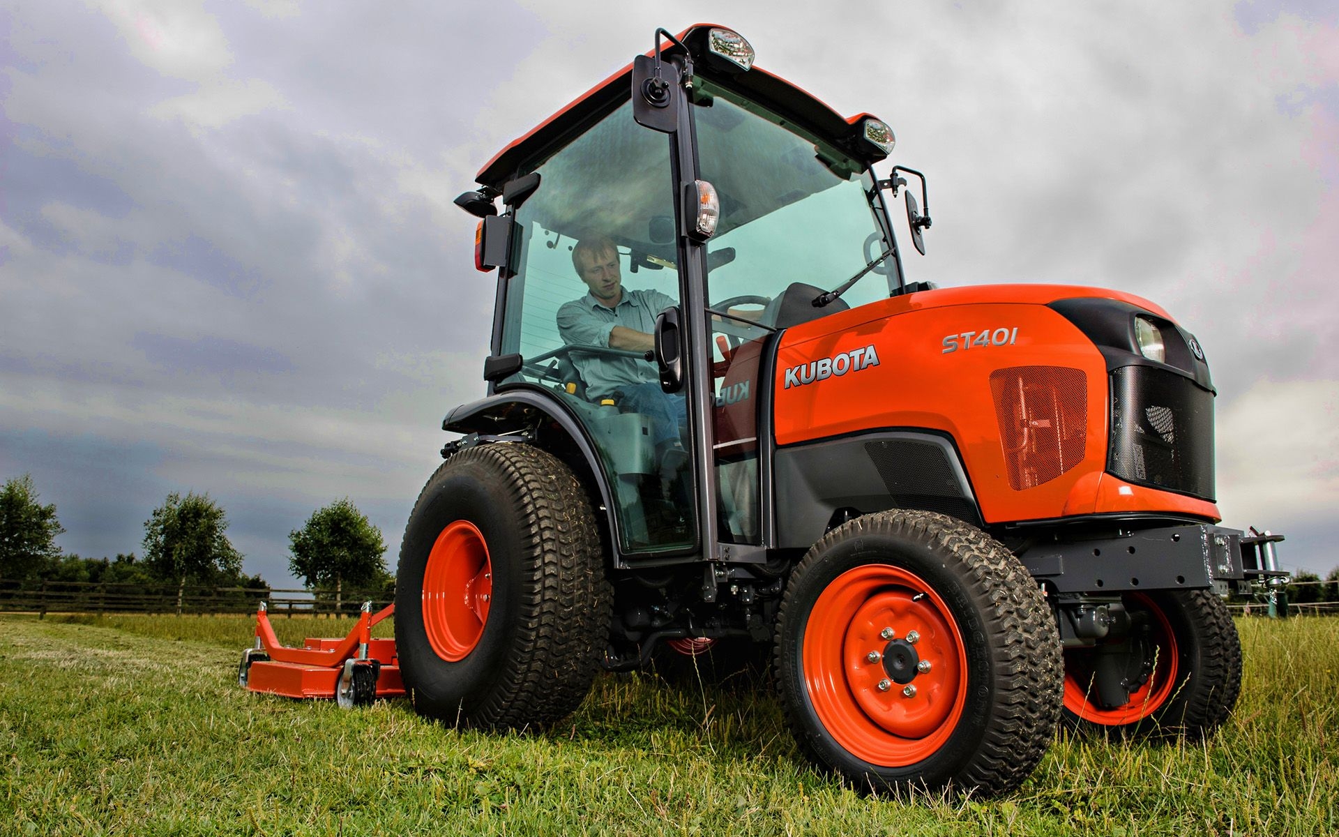 1920x1200 Download wallpaper Kubota ST picking grass, 2020 tractors, Desktop