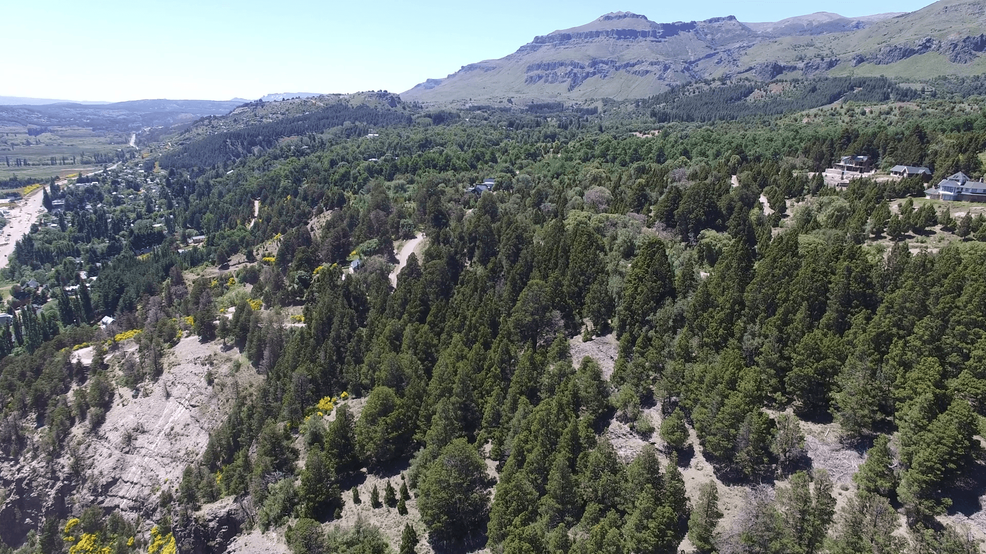 1920x1080 Aerial drone scene of houses in the woods in mountain in south, Desktop