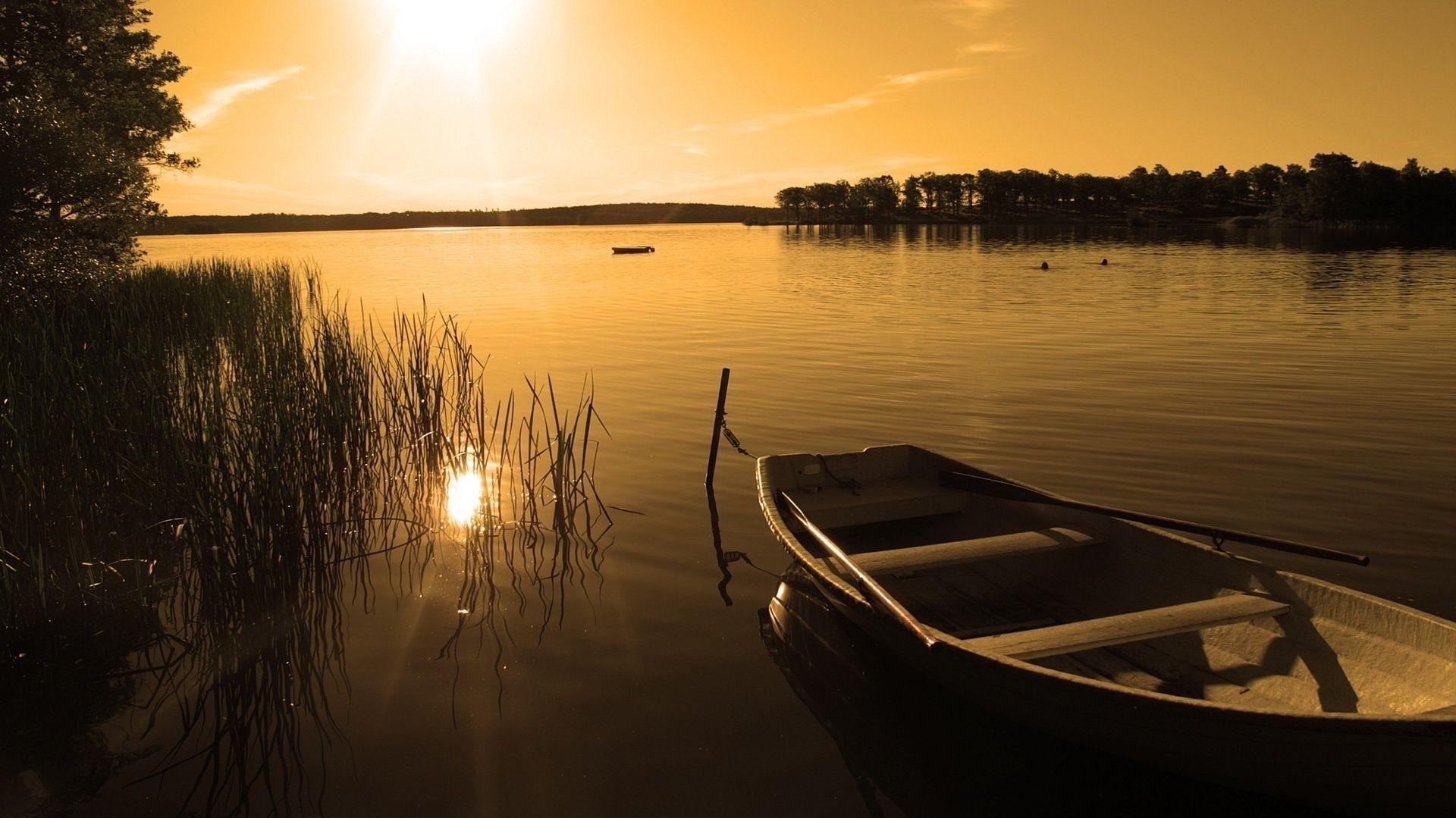 1920x1080 Rowing boat on the lake among the reeds. Android wallpaper for free, Desktop