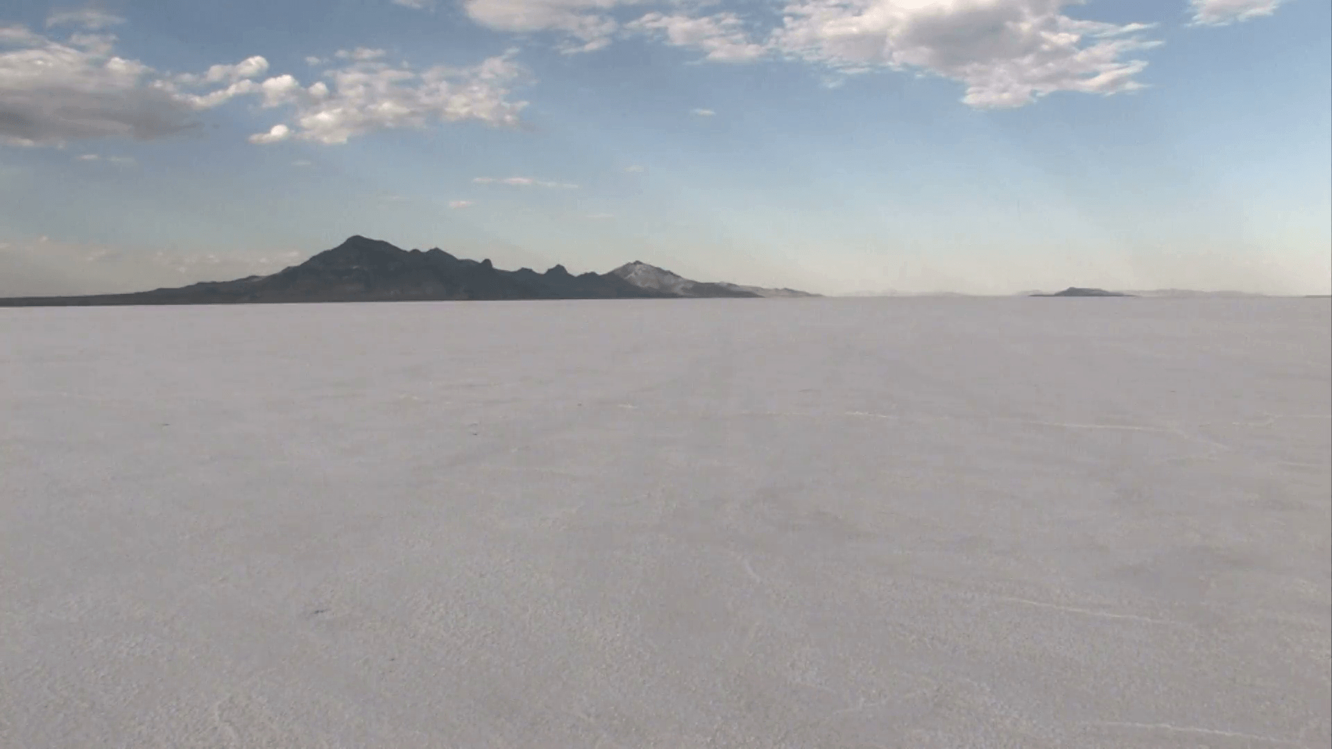 1920x1080 Speeding on Bonneville Salt Flats away Utah M HD Stock Video Footage, Desktop