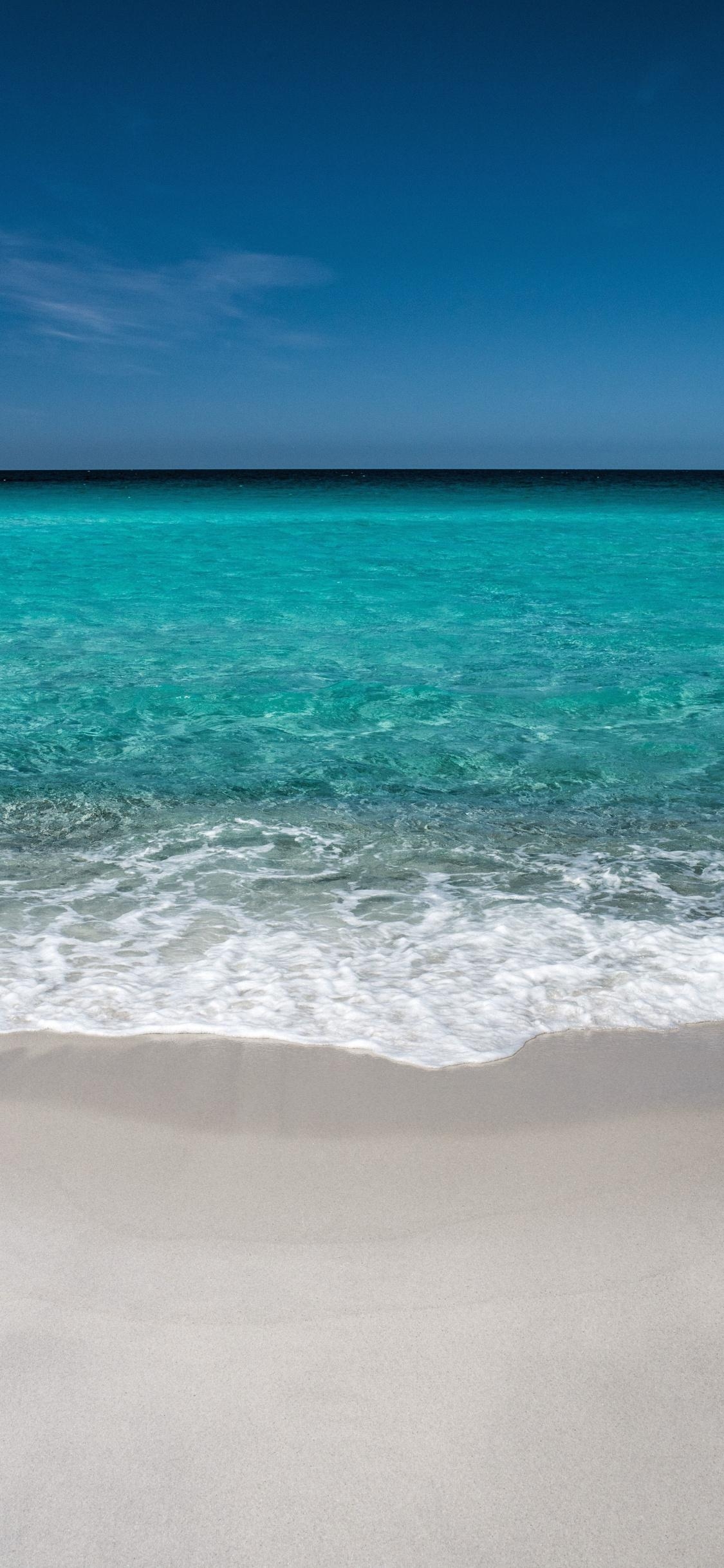 1130x2440 Download  wallpaper beach, soft, sea waves, blue sea, Phone