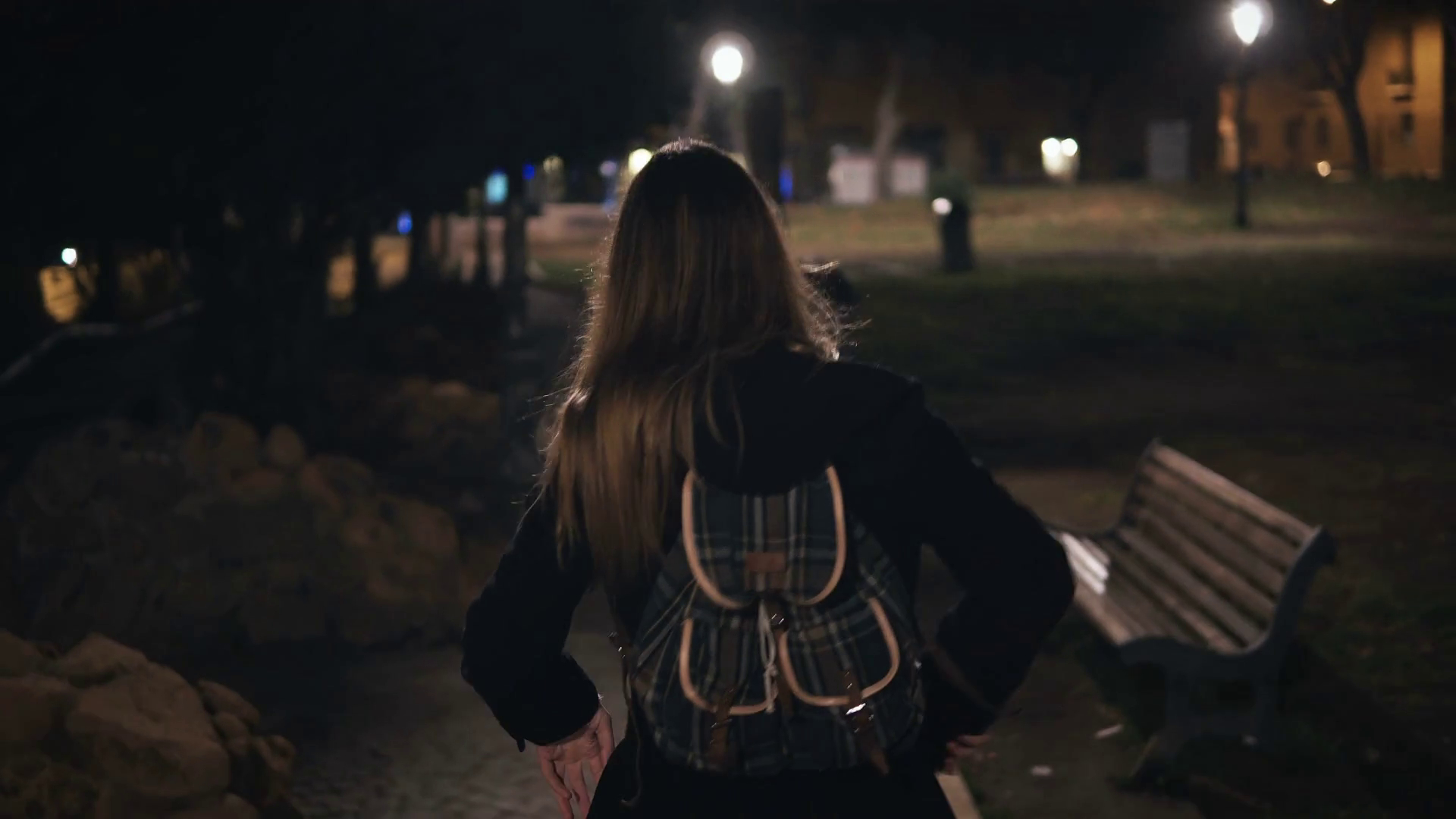 1920x1080 Back view of young stylish woman walking late at nightk park. going in the evening alone. Stock Video Footage, Desktop