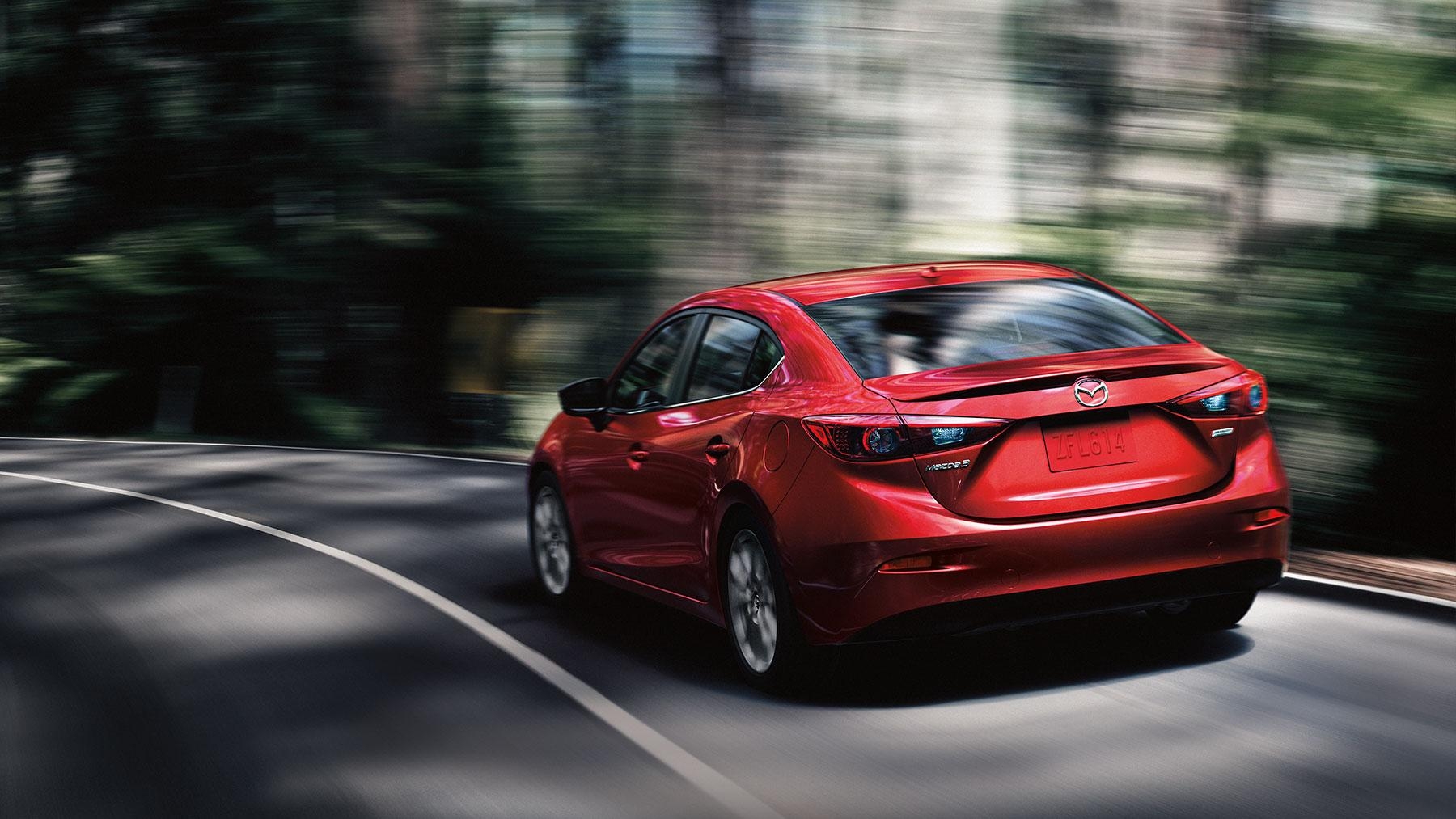 1800x1020 Mazda 3 red color rear back side view on highway in forest 4k, Desktop