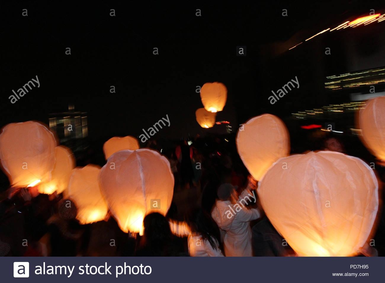 1300x960 Sky lanterns floating in the sky. Deepavali lights festival. Chinese, Desktop