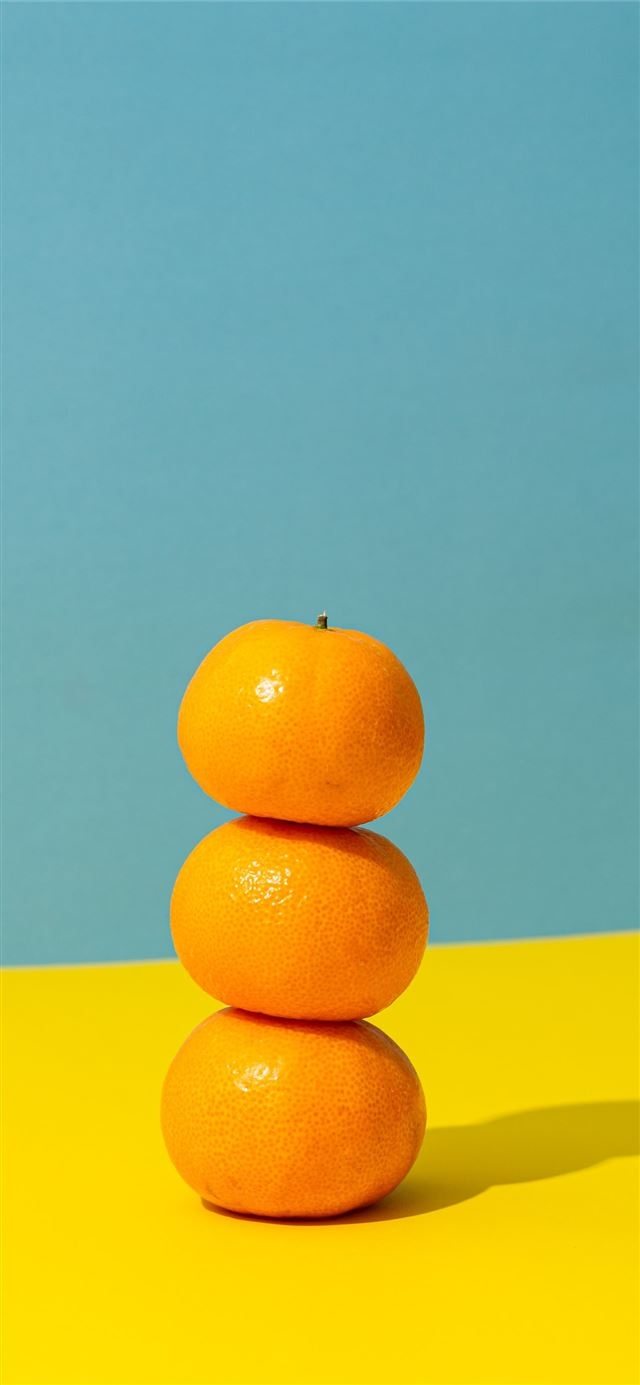 640x1390 orange fruit on yellow surface iPhone 8, Phone