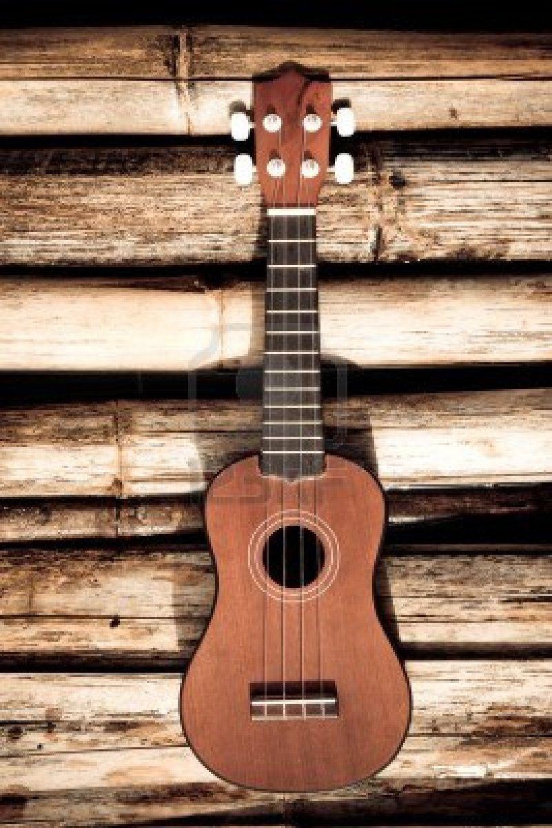 810x1200 Ukulele on bamboo background. music, Phone