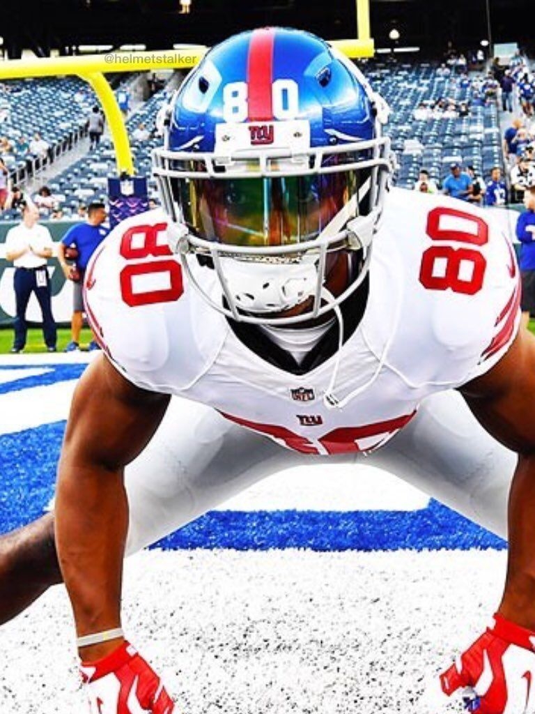 770x1030 New York Giants Wide Receiver Victor Cruz wearing a SHOC Clear Iridium Rainbow Football Visor. Football, College football uniforms, Football swag, Phone