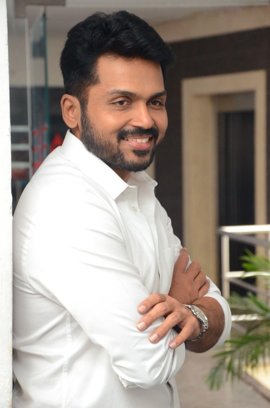 1060x1600 Tollywood Actor Karthi Beautiful Photo in White Shirt, Phone