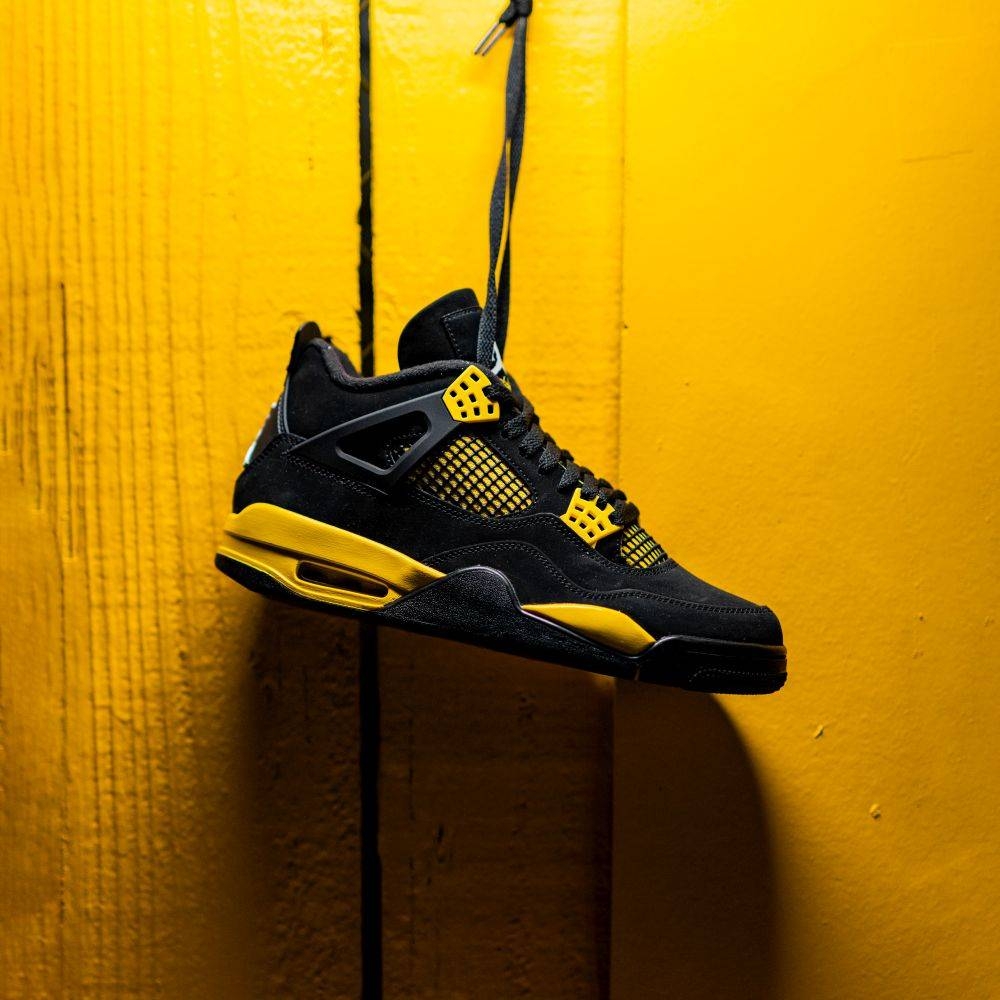 1000x1000 The Air Jordan 4 “Thunder”. Shoe, Phone